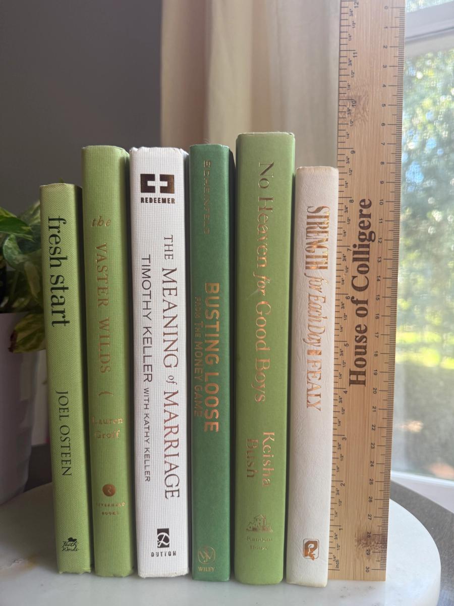 Curated collection of green books ranging from soft sage and olive to deeper botanical tones.