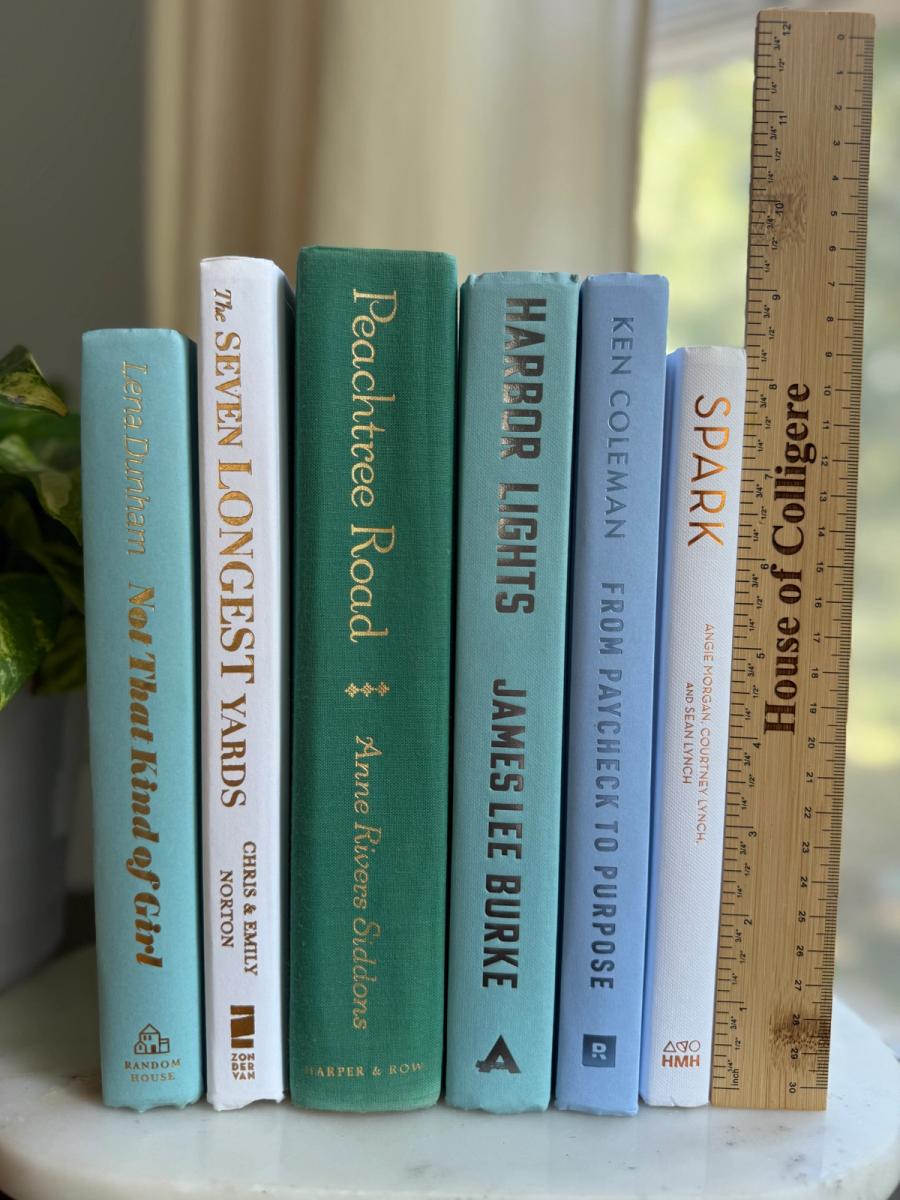Curated collection of soft blue, aqua, seafoam, and muted coastal-toned books.