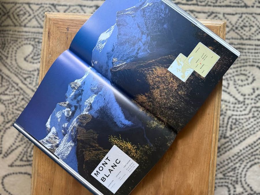 Blue, linen-like cloth covers, matte woven texture, subtle gold and metallic lettering, understated traditional styling