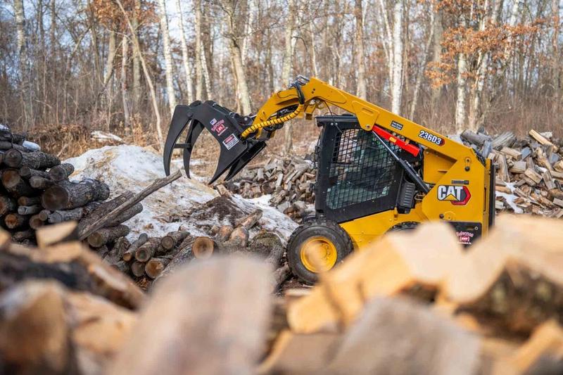 Wood grasp attachment for skid steers