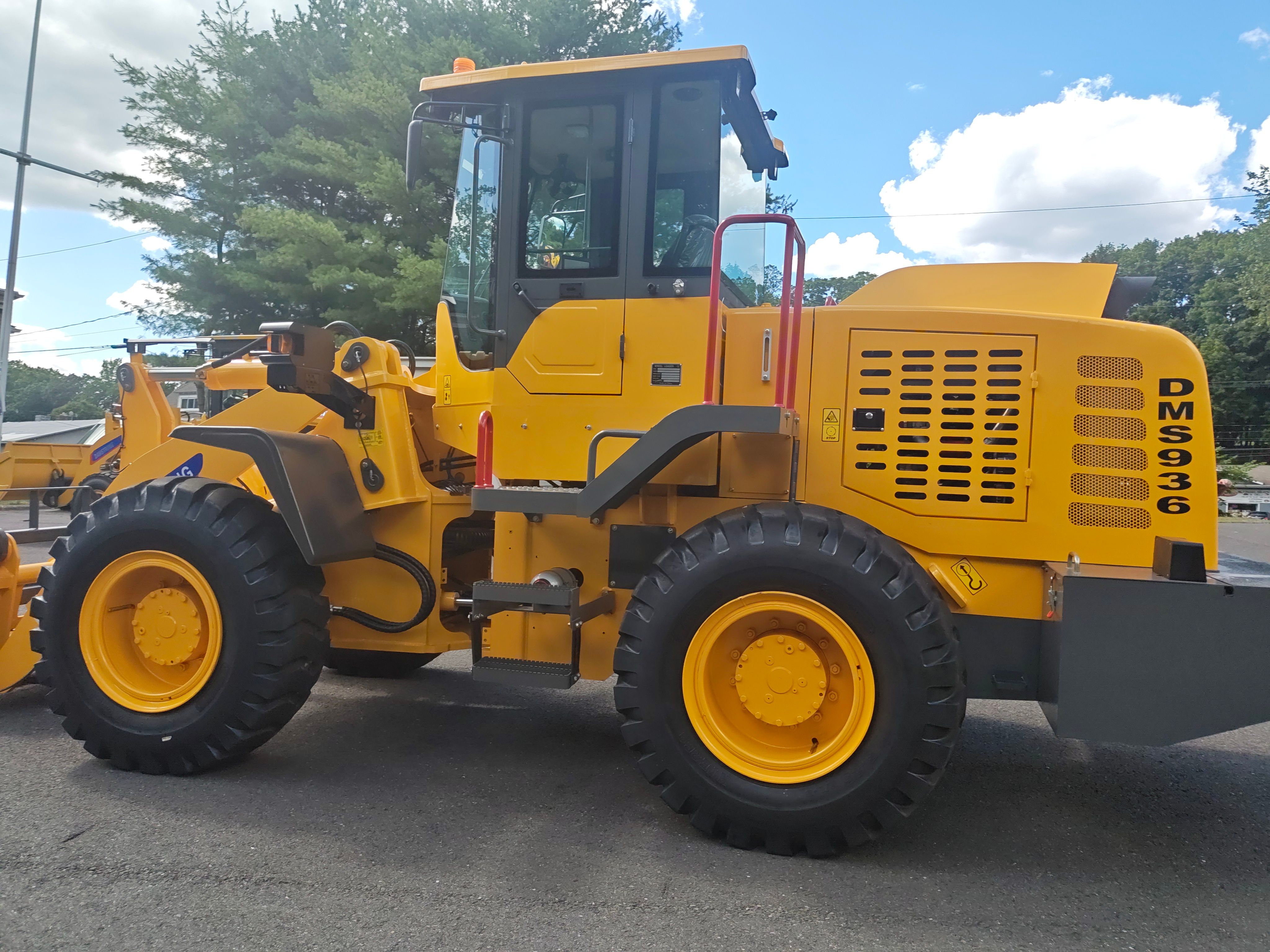 Choosing the Right Loader for Auto Body Shops and Industrial Yards