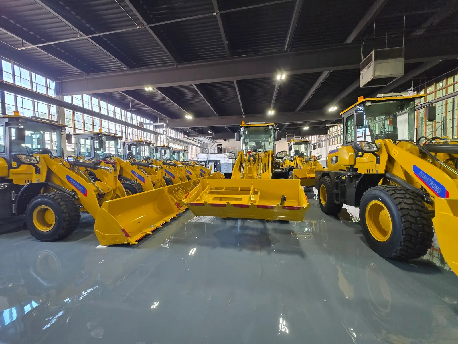 Wheel loaders in a parking lot