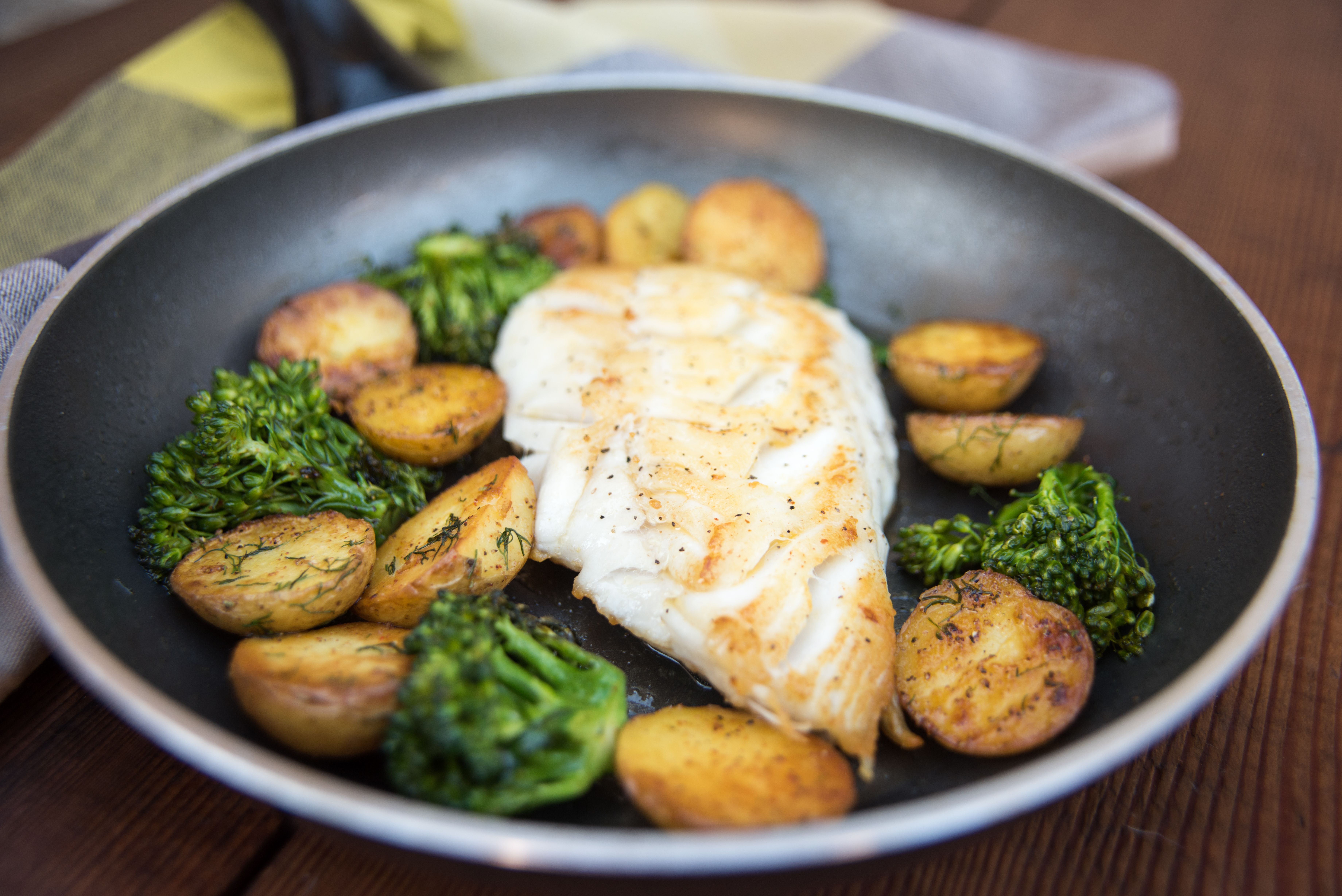 Black cod with potatoes and broccoli