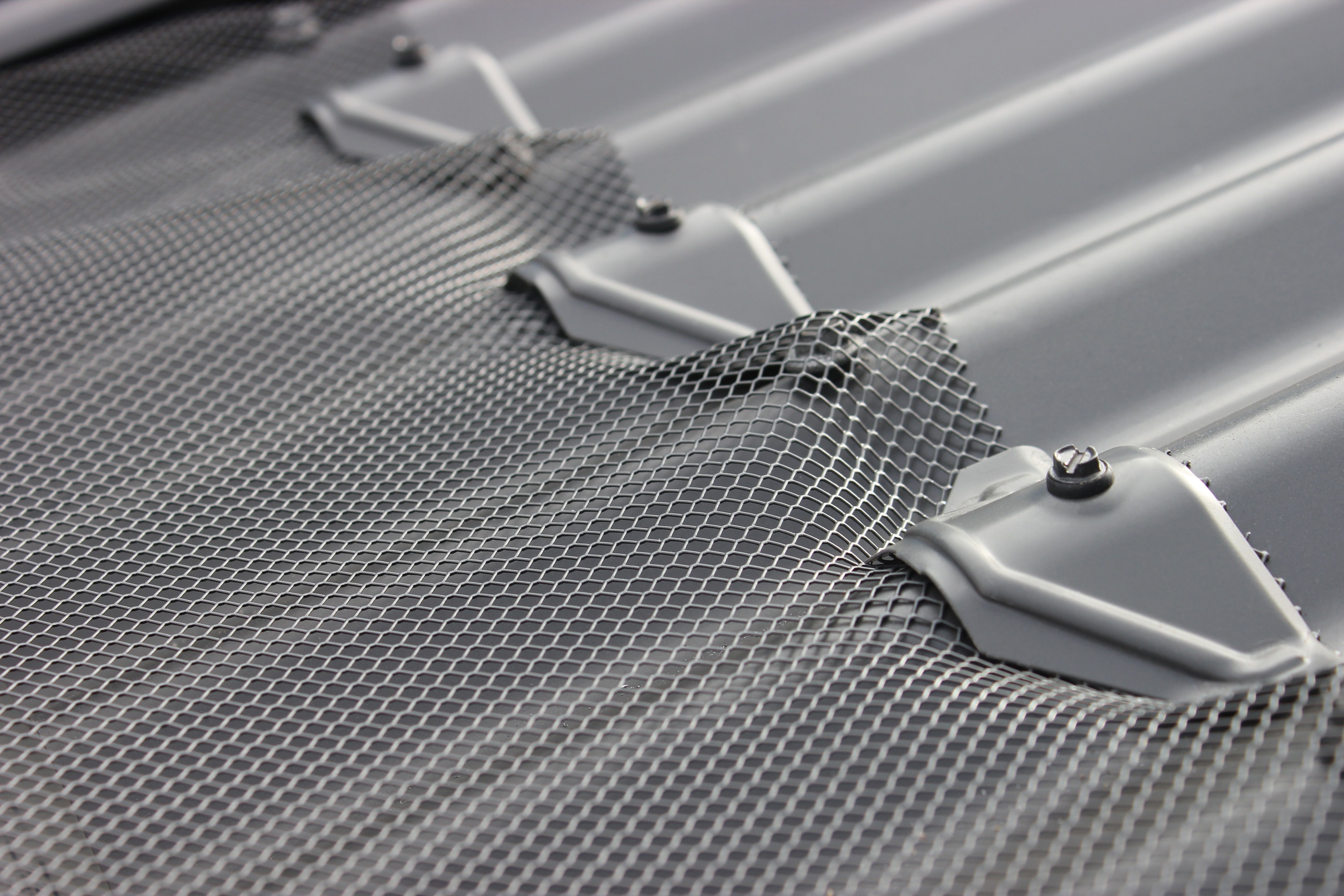 Fixed directly to your roof sheet and gutter.
