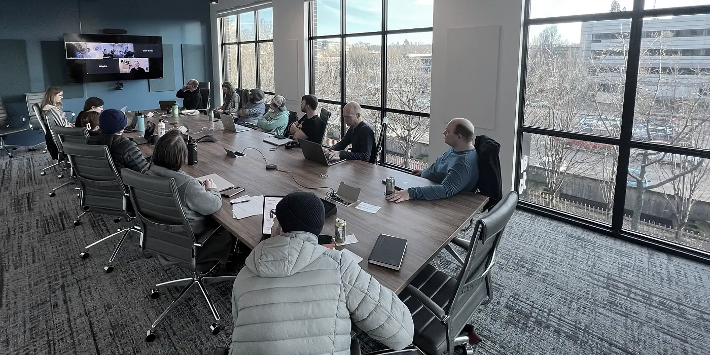 Twenty Ideas employees in conference room