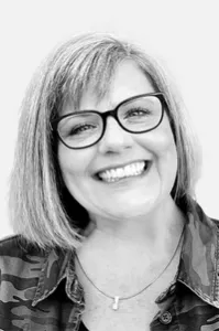 Portrait of Director of Operations Traci in black and white