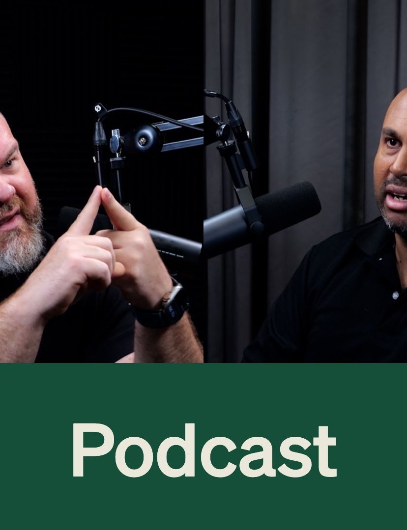 Marcus Petrovic and Edwin Narayan at podcast microphones discussing the Bathla administration