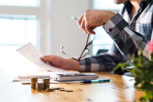 Man reviewing documents with coins and calculator on a desk.​​​​‌﻿‍﻿​‍​‍‌‍﻿﻿‌﻿​‍‌‍‍‌‌‍‌﻿‌‍‍‌‌‍﻿‍​‍​‍​﻿‍‍​‍​‍‌﻿​﻿‌‍​‌‌‍﻿‍‌‍‍‌‌﻿‌​‌﻿‍‌​‍﻿‍‌‍‍‌‌‍﻿﻿​‍​‍​‍﻿​​‍​‍‌‍‍​‌﻿​‍‌‍‌‌‌‍‌‍​‍​‍​﻿‍‍​‍​‍‌‍‍​‌﻿‌​‌﻿‌​‌﻿​​‌﻿​﻿​﻿‍‍​‍﻿﻿​‍﻿﻿‌‍﻿‌‌‍​‌‌‍​﻿‌‍‍﻿‌‍​‌‌﻿‍‌​‍﻿‌‌‍‌﻿‌‍﻿﻿‌‍﻿﻿‌‍‌​‌﻿‌﻿‌‍‍‌‌‍﻿‍​‍﻿‍‌﻿​﻿‌‍​‌‌‍﻿‍‌‍‍‌‌﻿‌​‌﻿‍‌​‍﻿‍‌﻿​﻿‌﻿‌​‌﻿‌‌‌‍‌​‌‍‍‌‌‍﻿﻿​‍﻿﻿‌﻿​﻿‌﻿‌​‌﻿‌‌‌‍‌​‌‍‍‌‌‍﻿﻿​‍﻿﻿‌‍‍‌‌‍﻿‍‌﻿‌​‌‍‌‌‌‍﻿‍‌﻿‌​​‍﻿﻿‌‍‌‌‌‍‌​‌‍‍‌‌﻿‌​​‍﻿﻿‌‍﻿‌‌‍﻿﻿‌‍‌​‌‍‌‌​﻿﻿‌‌﻿​​‌﻿​‍‌‍‌‌‌﻿​﻿‌‍‌‌‌‍﻿‍‌﻿‌​‌‍​‌‌﻿‌​‌‍‍‌‌‍﻿﻿‌‍﻿‍​﻿‍﻿‌‍‍‌‌‍‌​​﻿﻿‌​﻿‌﻿​﻿​‌​﻿‌‌‌‍​‌​﻿​﻿​﻿​​​﻿​‌‌‍​﻿​‍﻿‌‌‍‌‍​﻿‍​‌‍‌​​﻿‌‌​‍﻿‌​﻿‌​​﻿‌​‌‍​‌‌‍​﻿​‍﻿‌​﻿‍​‌‍​﻿​﻿​‌‌‍​‍​‍﻿‌​﻿​‍‌‍​﻿​﻿‍‌‌‍‌​​﻿‌‍​﻿​﻿‌‍​﻿‌‍​﻿‌‍‌‌‌‍​﻿​﻿​‌​﻿‌‌​﻿‍﻿‌﻿‌​‌﻿‍‌‌﻿​​‌‍‌‌​﻿﻿‌‌﻿​​‌‍﻿﻿‌﻿​﻿‌﻿‌​​﻿‍﻿‌﻿​​‌‍​‌‌﻿‌​‌‍‍​​﻿﻿‌‌‍‍‌‌‍﻿‌‌‍​‌‌‍‌﻿‌‍‌‌​‍﻿‍‌‍​‌‌‍﻿​‌﻿‌​​﻿﻿﻿‌‍​‍‌‍​‌‌﻿​﻿‌‍‌‌‌‌‌‌‌﻿​‍‌‍﻿​​﻿﻿‌‌‍‍​‌﻿‌​‌﻿‌​‌﻿​​‌﻿​﻿​‍‌‌​﻿​﻿‌​​‌​‍‌‌​﻿​‍‌​‌‍​‍‌‌​﻿​‍‌​‌‍‌‍﻿‌‌‍​‌‌‍​﻿‌‍‍﻿‌‍​‌‌﻿‍‌​‍﻿‌‌‍‌﻿‌‍﻿﻿‌‍﻿﻿‌‍‌​‌﻿‌﻿‌‍‍‌‌‍﻿‍​‍﻿‍‌﻿​﻿‌‍​‌‌‍﻿‍‌‍‍‌‌﻿‌​‌﻿‍‌​‍﻿‍‌﻿​﻿‌﻿‌​‌﻿‌‌‌‍‌​‌‍‍‌‌‍﻿﻿​‍‌‌​﻿​‍‌​‌‍‌﻿​﻿‌﻿‌​‌﻿‌‌‌‍‌​‌‍‍‌‌‍﻿﻿​‍‌‍‌‍‍‌‌‍‌​​﻿﻿‌​﻿‌﻿​﻿​‌​﻿‌‌‌‍​‌​﻿​﻿​﻿​​​﻿​‌‌‍​﻿​‍﻿‌‌‍‌‍​﻿‍​‌‍‌​​﻿‌‌​‍﻿‌​﻿‌​​﻿‌​‌‍​‌‌‍​﻿​‍﻿‌​﻿‍​‌‍​﻿​﻿​‌‌‍​‍​‍﻿‌​﻿​‍‌‍​﻿​﻿‍‌‌‍‌​​﻿‌‍​﻿​﻿‌‍​﻿‌‍​﻿‌‍‌‌‌‍​﻿​﻿​‌​﻿‌‌​‍‌‍‌﻿‌​‌﻿‍‌‌﻿​​‌‍‌‌​﻿﻿‌‌﻿​​‌‍﻿﻿‌﻿​﻿‌﻿‌​​‍‌‍‌﻿​​‌‍​‌‌﻿‌​‌‍‍​​﻿﻿‌‌‍‍‌‌‍﻿‌‌‍​‌‌‍‌﻿‌‍‌‌​‍﻿‍‌‍​‌‌‍﻿​‌﻿‌​​‍‌‍‌﻿​​‌‍‌‌‌﻿​‍‌﻿​﻿‌﻿​​‌‍‌‌‌‍​﻿‌﻿‌​‌‍‍‌‌﻿‌‍‌‍‌‌​﻿﻿‌‌﻿​​‌﻿‌‌‌‍​‍‌‍﻿​‌‍‍‌‌﻿​﻿‌‍‍​‌‍‌‌‌‍‌​​‍​‍‌﻿﻿‌