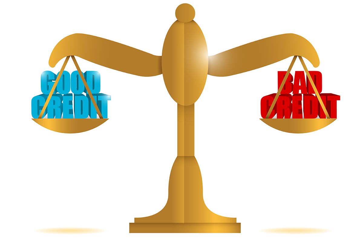 a scale with the words good credit and bad credit on it .