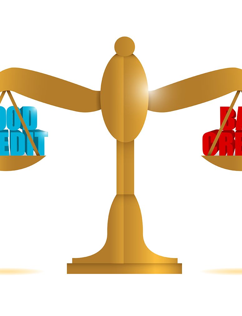 a scale with the words good credit and bad credit on it .