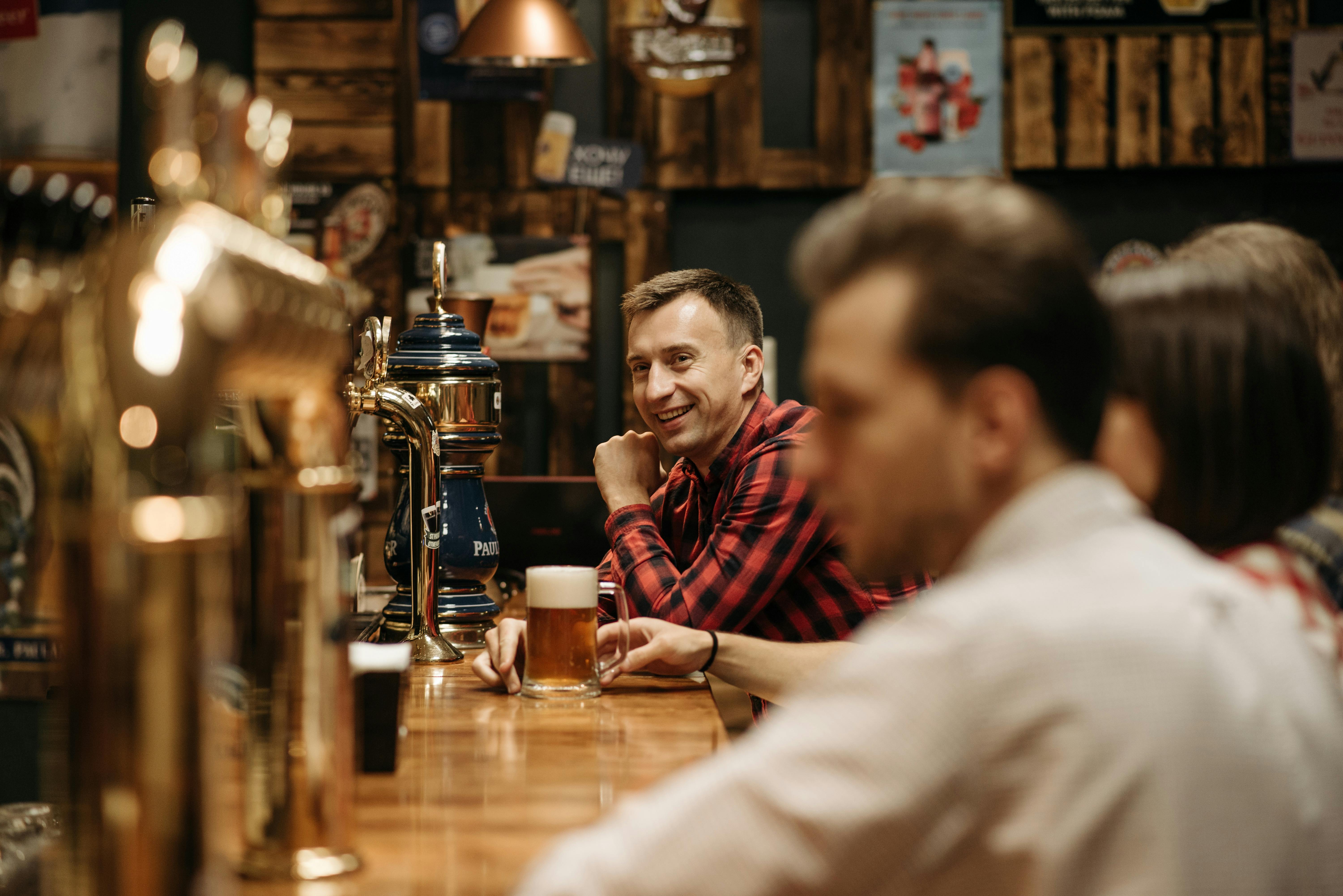 A man in a red plaid shirt smiles while holding a glass of beer at a bar.​​​​‌﻿‍﻿​‍​‍‌‍﻿﻿‌﻿​‍‌‍‍‌‌‍‌﻿‌‍‍‌‌‍﻿‍​‍​‍​﻿‍‍​‍​‍‌﻿​﻿‌‍​‌‌‍﻿‍‌‍‍‌‌﻿‌​‌﻿‍‌​‍﻿‍‌‍‍‌‌‍﻿﻿​‍​‍​‍﻿​​‍​‍‌‍‍​‌﻿​‍‌‍‌‌‌‍‌‍​‍​‍​﻿‍‍​‍​‍‌‍‍​‌﻿‌​‌﻿‌​‌﻿​​‌﻿​﻿​﻿‍‍​‍﻿﻿​‍﻿﻿‌‍﻿‌‌‍​‌‌‍​﻿‌‍‍﻿‌‍​‌‌﻿‍‌​‍﻿‌‌‍‌﻿‌‍﻿﻿‌‍﻿﻿‌‍‌​‌﻿‌﻿‌‍‍‌‌‍﻿‍​‍﻿‍‌﻿​﻿‌‍​‌‌‍﻿‍‌‍‍‌‌﻿‌​‌﻿‍‌​‍﻿‍‌﻿​﻿‌﻿‌​‌﻿‌‌‌‍‌​‌‍‍‌‌‍﻿﻿​‍﻿﻿‌﻿​﻿‌﻿‌​‌﻿‌‌‌‍‌​‌‍‍‌‌‍﻿﻿​‍﻿﻿‌‍‍‌‌‍﻿‍‌﻿‌​‌‍‌‌‌‍﻿‍‌﻿‌​​‍﻿﻿‌‍‌‌‌‍‌​‌‍‍‌‌﻿‌​​‍﻿﻿‌‍﻿‌‌‍﻿﻿‌‍‌​‌‍‌‌​﻿﻿‌‌﻿​​‌﻿​‍‌‍‌‌‌﻿​﻿‌‍‌‌‌‍﻿‍‌﻿‌​‌‍​‌‌﻿‌​‌‍‍‌‌‍﻿﻿‌‍﻿‍​﻿‍﻿‌‍‍‌‌‍‌​​﻿﻿‌​﻿‌‌‌‍​‍​﻿​‌‌‍‌​​﻿‍​​﻿​‌‌‍‌‍​﻿​​​‍﻿‌​﻿​‌​﻿‌​‌‍‌‍​﻿‌﻿​‍﻿‌​﻿‌​​﻿‍‌​﻿‌‌‌‍‌‍​‍﻿‌​﻿‍‌‌‍​﻿​﻿‍‌​﻿‍‌​‍﻿‌‌‍‌‍​﻿‍‌‌‍​‌‌‍​‌​﻿​﻿‌‍‌‌‌‍‌‍‌‍‌‍​﻿‍‌​﻿​‌​﻿‍‌‌‍‌​​﻿‍﻿‌﻿‌​‌﻿‍‌‌﻿​​‌‍‌‌​﻿﻿‌‌﻿​​‌‍﻿﻿‌﻿​﻿‌﻿‌​​﻿‍﻿‌﻿​​‌‍​‌‌﻿‌​‌‍‍​​﻿﻿‌‌‍‍‌‌‍﻿‌‌‍​‌‌‍‌﻿‌‍‌‌​‍﻿‍‌‍​‌‌‍﻿​‌﻿‌​​﻿﻿﻿‌‍​‍‌‍​‌‌﻿​﻿‌‍‌‌‌‌‌‌‌﻿​‍‌‍﻿​​﻿﻿‌‌‍‍​‌﻿‌​‌﻿‌​‌﻿​​‌﻿​﻿​‍‌‌​﻿​﻿‌​​‌​‍‌‌​﻿​‍‌​‌‍​‍‌‌​﻿​‍‌​‌‍‌‍﻿‌‌‍​‌‌‍​﻿‌‍‍﻿‌‍​‌‌﻿‍‌​‍﻿‌‌‍‌﻿‌‍﻿﻿‌‍﻿﻿‌‍‌​‌﻿‌﻿‌‍‍‌‌‍﻿‍​‍﻿‍‌﻿​﻿‌‍​‌‌‍﻿‍‌‍‍‌‌﻿‌​‌﻿‍‌​‍﻿‍‌﻿​﻿‌﻿‌​‌﻿‌‌‌‍‌​‌‍‍‌‌‍﻿﻿​‍‌‌​﻿​‍‌​‌‍‌﻿​﻿‌﻿‌​‌﻿‌‌‌‍‌​‌‍‍‌‌‍﻿﻿​‍‌‍‌‍‍‌‌‍‌​​﻿﻿‌​﻿‌‌‌‍​‍​﻿​‌‌‍‌​​﻿‍​​﻿​‌‌‍‌‍​﻿​​​‍﻿‌​﻿​‌​﻿‌​‌‍‌‍​﻿‌﻿​‍﻿‌​﻿‌​​﻿‍‌​﻿‌‌‌‍‌‍​‍﻿‌​﻿‍‌‌‍​﻿​﻿‍‌​﻿‍‌​‍﻿‌‌‍‌‍​﻿‍‌‌‍​‌‌‍​‌​﻿​﻿‌‍‌‌‌‍‌‍‌‍‌‍​﻿‍‌​﻿​‌​﻿‍‌‌‍‌​​‍‌‍‌﻿‌​‌﻿‍‌‌﻿​​‌‍‌‌​﻿﻿‌‌﻿​​‌‍﻿﻿‌﻿​﻿‌﻿‌​​‍‌‍‌﻿​​‌‍​‌‌﻿‌​‌‍‍​​﻿﻿‌‌‍‍‌‌‍﻿‌‌‍​‌‌‍‌﻿‌‍‌‌​‍﻿‍‌‍​‌‌‍﻿​‌﻿‌​​‍‌‍‌﻿​​‌‍‌‌‌﻿​‍‌﻿​﻿‌﻿​​‌‍‌‌‌‍​﻿‌﻿‌​‌‍‍‌‌﻿‌‍‌‍‌‌​﻿﻿‌‌﻿​​‌﻿‌‌‌‍​‍‌‍﻿​‌‍‍‌‌﻿​﻿‌‍‍​‌‍‌‌‌‍‌​​‍​‍‌﻿﻿‌