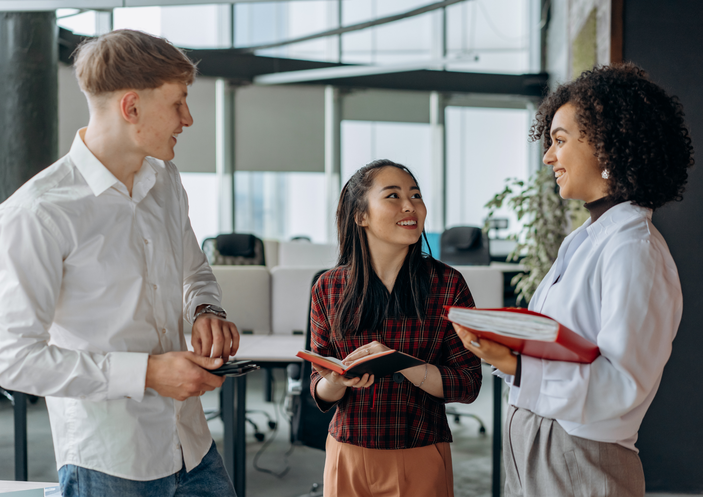 Three diverse colleagues, a man and two women, smiling and talking in an office.​​​​‌﻿‍﻿​‍​‍‌‍﻿﻿‌﻿​‍‌‍‍‌‌‍‌﻿‌‍‍‌‌‍﻿‍​‍​‍​﻿‍‍​‍​‍‌﻿​﻿‌‍​‌‌‍﻿‍‌‍‍‌‌﻿‌​‌﻿‍‌​‍﻿‍‌‍‍‌‌‍﻿﻿​‍​‍​‍﻿​​‍​‍‌‍‍​‌﻿​‍‌‍‌‌‌‍‌‍​‍​‍​﻿‍‍​‍​‍‌‍‍​‌﻿‌​‌﻿‌​‌﻿​​‌﻿​﻿​﻿‍‍​‍﻿﻿​‍﻿﻿‌‍﻿‌‌‍​‌‌‍​﻿‌‍‍﻿‌‍​‌‌﻿‍‌​‍﻿‌‌‍‌﻿‌‍﻿﻿‌‍﻿﻿‌‍‌​‌﻿‌﻿‌‍‍‌‌‍﻿‍​‍﻿‍‌﻿​﻿‌‍​‌‌‍﻿‍‌‍‍‌‌﻿‌​‌﻿‍‌​‍﻿‍‌﻿​﻿‌﻿‌​‌﻿‌‌‌‍‌​‌‍‍‌‌‍﻿﻿​‍﻿﻿‌﻿​﻿‌﻿‌​‌﻿‌‌‌‍‌​‌‍‍‌‌‍﻿﻿​‍﻿﻿‌‍‍‌‌‍﻿‍‌﻿‌​‌‍‌‌‌‍﻿‍‌﻿‌​​‍﻿﻿‌‍‌‌‌‍‌​‌‍‍‌‌﻿‌​​‍﻿﻿‌‍﻿‌‌‍﻿﻿‌‍‌​‌‍‌‌​﻿﻿‌‌﻿​​‌﻿​‍‌‍‌‌‌﻿​﻿‌‍‌‌‌‍﻿‍‌﻿‌​‌‍​‌‌﻿‌​‌‍‍‌‌‍﻿﻿‌‍﻿‍​﻿‍﻿‌‍‍‌‌‍‌​​﻿﻿‌​﻿​‌​﻿‌‍​﻿‌‍‌‍​﻿​﻿‌‍‌‍‌​‌‍​‌‌‍‌​​‍﻿‌‌‍‌‌​﻿​‍​﻿‌‍​﻿‌‍​‍﻿‌​﻿‌​‌‍​﻿​﻿‌​​﻿‍​​‍﻿‌​﻿‍​​﻿​﻿​﻿‍​​﻿‍‌​‍﻿‌‌‍​‌​﻿‌​‌‍​﻿​﻿‍​‌‍‌‌​﻿​‌‌‍​‍​﻿‌‌‌‍​﻿​﻿‍​‌‍‌‍‌‍​‌​﻿‍﻿‌﻿‌​‌﻿‍‌‌﻿​​‌‍‌‌​﻿﻿‌‌﻿​​‌‍﻿﻿‌﻿​﻿‌﻿‌​​﻿‍﻿‌﻿​​‌‍​‌‌﻿‌​‌‍‍​​﻿﻿‌‌‍‍‌‌‍﻿‌‌‍​‌‌‍‌﻿‌‍‌‌​‍﻿‍‌‍​‌‌‍﻿​‌﻿‌​​﻿﻿﻿‌‍​‍‌‍​‌‌﻿​﻿‌‍‌‌‌‌‌‌‌﻿​‍‌‍﻿​​﻿﻿‌‌‍‍​‌﻿‌​‌﻿‌​‌﻿​​‌﻿​﻿​‍‌‌​﻿​﻿‌​​‌​‍‌‌​﻿​‍‌​‌‍​‍‌‌​﻿​‍‌​‌‍‌‍﻿‌‌‍​‌‌‍​﻿‌‍‍﻿‌‍​‌‌﻿‍‌​‍﻿‌‌‍‌﻿‌‍﻿﻿‌‍﻿﻿‌‍‌​‌﻿‌﻿‌‍‍‌‌‍﻿‍​‍﻿‍‌﻿​﻿‌‍​‌‌‍﻿‍‌‍‍‌‌﻿‌​‌﻿‍‌​‍﻿‍‌﻿​﻿‌﻿‌​‌﻿‌‌‌‍‌​‌‍‍‌‌‍﻿﻿​‍‌‌​﻿​‍‌​‌‍‌﻿​﻿‌﻿‌​‌﻿‌‌‌‍‌​‌‍‍‌‌‍﻿﻿​‍‌‍‌‍‍‌‌‍‌​​﻿﻿‌​﻿​‌​﻿‌‍​﻿‌‍‌‍​﻿​﻿‌‍‌‍‌​‌‍​‌‌‍‌​​‍﻿‌‌‍‌‌​﻿​‍​﻿‌‍​﻿‌‍​‍﻿‌​﻿‌​‌‍​﻿​﻿‌​​﻿‍​​‍﻿‌​﻿‍​​﻿​﻿​﻿‍​​﻿‍‌​‍﻿‌‌‍​‌​﻿‌​‌‍​﻿​﻿‍​‌‍‌‌​﻿​‌‌‍​‍​﻿‌‌‌‍​﻿​﻿‍​‌‍‌‍‌‍​‌​‍‌‍‌﻿‌​‌﻿‍‌‌﻿​​‌‍‌‌​﻿﻿‌‌﻿​​‌‍﻿﻿‌﻿​﻿‌﻿‌​​‍‌‍‌﻿​​‌‍​‌‌﻿‌​‌‍‍​​﻿﻿‌‌‍‍‌‌‍﻿‌‌‍​‌‌‍‌﻿‌‍‌‌​‍﻿‍‌‍​‌‌‍﻿​‌﻿‌​​‍‌‍‌﻿​​‌‍‌‌‌﻿​‍‌﻿​﻿‌﻿​​‌‍‌‌‌‍​﻿‌﻿‌​‌‍‍‌‌﻿‌‍‌‍‌‌​﻿﻿‌‌﻿​​‌﻿‌‌‌‍​‍‌‍﻿​‌‍‍‌‌﻿​﻿‌‍‍​‌‍‌‌‌‍‌​​‍​‍‌﻿﻿‌