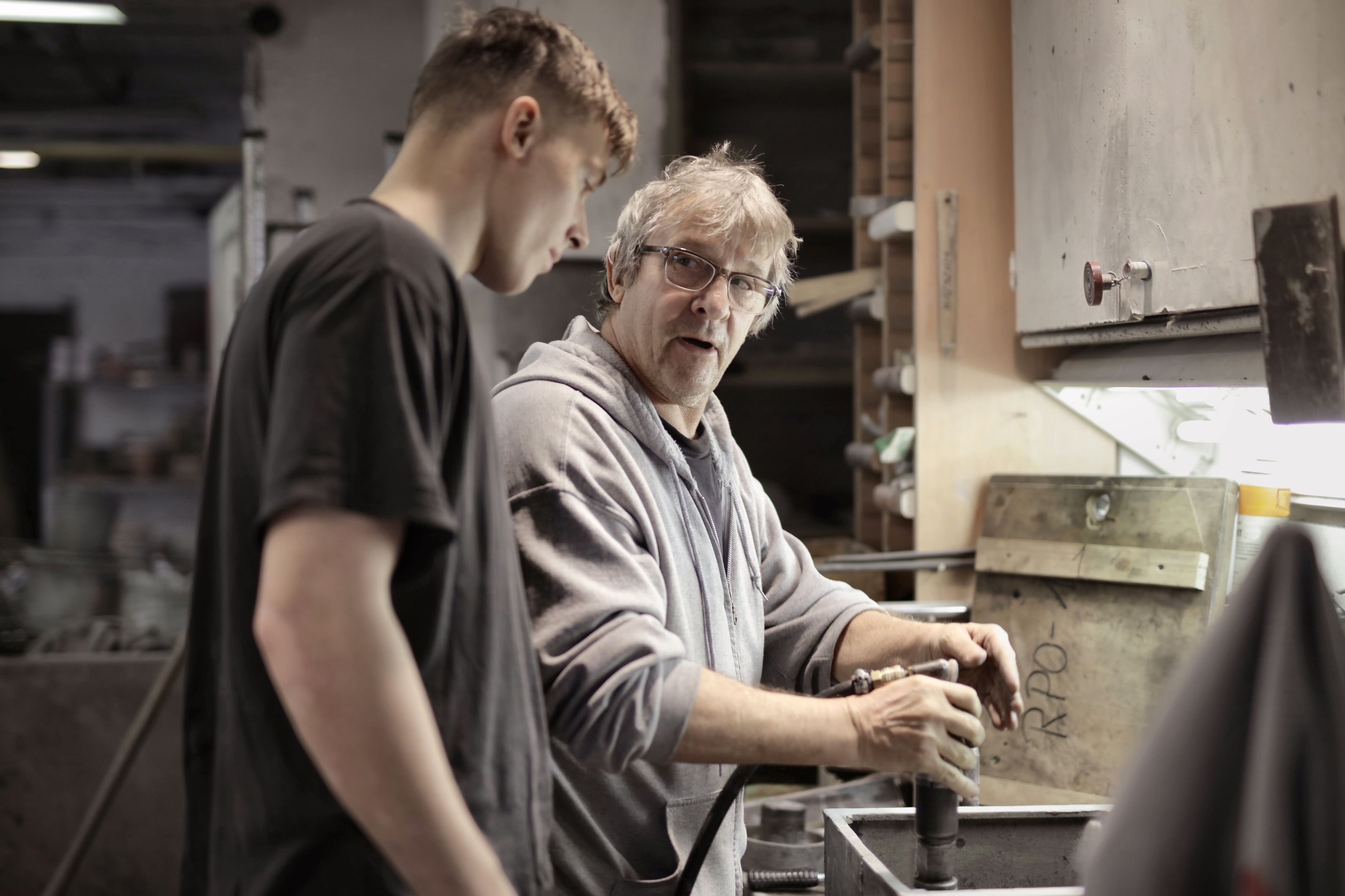 An older man demonstrates a tool to a younger man in a workshop.​​​​‌﻿‍﻿​‍​‍‌‍﻿﻿‌﻿​‍‌‍‍‌‌‍‌﻿‌‍‍‌‌‍﻿‍​‍​‍​﻿‍‍​‍​‍‌﻿​﻿‌‍​‌‌‍﻿‍‌‍‍‌‌﻿‌​‌﻿‍‌​‍﻿‍‌‍‍‌‌‍﻿﻿​‍​‍​‍﻿​​‍​‍‌‍‍​‌﻿​‍‌‍‌‌‌‍‌‍​‍​‍​﻿‍‍​‍​‍‌‍‍​‌﻿‌​‌﻿‌​‌﻿​​‌﻿​﻿​﻿‍‍​‍﻿﻿​‍﻿﻿‌‍﻿‌‌‍​‌‌‍​﻿‌‍‍﻿‌‍​‌‌﻿‍‌​‍﻿‌‌‍‌﻿‌‍﻿﻿‌‍﻿﻿‌‍‌​‌﻿‌﻿‌‍‍‌‌‍﻿‍​‍﻿‍‌﻿​﻿‌‍​‌‌‍﻿‍‌‍‍‌‌﻿‌​‌﻿‍‌​‍﻿‍‌﻿​﻿‌﻿‌​‌﻿‌‌‌‍‌​‌‍‍‌‌‍﻿﻿​‍﻿﻿‌﻿​﻿‌﻿‌​‌﻿‌‌‌‍‌​‌‍‍‌‌‍﻿﻿​‍﻿﻿‌‍‍‌‌‍﻿‍‌﻿‌​‌‍‌‌‌‍﻿‍‌﻿‌​​‍﻿﻿‌‍‌‌‌‍‌​‌‍‍‌‌﻿‌​​‍﻿﻿‌‍﻿‌‌‍﻿﻿‌‍‌​‌‍‌‌​﻿﻿‌‌﻿​​‌﻿​‍‌‍‌‌‌﻿​﻿‌‍‌‌‌‍﻿‍‌﻿‌​‌‍​‌‌﻿‌​‌‍‍‌‌‍﻿﻿‌‍﻿‍​﻿‍﻿‌‍‍‌‌‍‌​​﻿﻿‌​﻿​​‌‍‌‌‌‍​﻿‌‍‌‍​﻿‌​​﻿‌﻿​﻿‌‍‌‍‌‌​‍﻿‌​﻿​​​﻿‍‌​﻿​​‌‍‌​​‍﻿‌​﻿‌​‌‍​﻿​﻿​​‌‍‌‌​‍﻿‌‌‍​‌​﻿‌‍​﻿​​​﻿​​​‍﻿‌​﻿​‍‌‍​‍​﻿​‌‌‍​﻿‌‍​‌​﻿​﻿​﻿​‌‌‍‌​​﻿​​​﻿‌﻿​﻿​‌‌‍‌‍​﻿‍﻿‌﻿‌​‌﻿‍‌‌﻿​​‌‍‌‌​﻿﻿‌‌﻿​​‌‍﻿﻿‌﻿​﻿‌﻿‌​​﻿‍﻿‌﻿​​‌‍​‌‌﻿‌​‌‍‍​​﻿﻿‌‌‍‍‌‌‍﻿‌‌‍​‌‌‍‌﻿‌‍‌‌​‍﻿‍‌‍​‌‌‍﻿​‌﻿‌​​﻿﻿﻿‌‍​‍‌‍​‌‌﻿​﻿‌‍‌‌‌‌‌‌‌﻿​‍‌‍﻿​​﻿﻿‌‌‍‍​‌﻿‌​‌﻿‌​‌﻿​​‌﻿​﻿​‍‌‌​﻿​﻿‌​​‌​‍‌‌​﻿​‍‌​‌‍​‍‌‌​﻿​‍‌​‌‍‌‍﻿‌‌‍​‌‌‍​﻿‌‍‍﻿‌‍​‌‌﻿‍‌​‍﻿‌‌‍‌﻿‌‍﻿﻿‌‍﻿﻿‌‍‌​‌﻿‌﻿‌‍‍‌‌‍﻿‍​‍﻿‍‌﻿​﻿‌‍​‌‌‍﻿‍‌‍‍‌‌﻿‌​‌﻿‍‌​‍﻿‍‌﻿​﻿‌﻿‌​‌﻿‌‌‌‍‌​‌‍‍‌‌‍﻿﻿​‍‌‌​﻿​‍‌​‌‍‌﻿​﻿‌﻿‌​‌﻿‌‌‌‍‌​‌‍‍‌‌‍﻿﻿​‍‌‍‌‍‍‌‌‍‌​​﻿﻿‌​﻿​​‌‍‌‌‌‍​﻿‌‍‌‍​﻿‌​​﻿‌﻿​﻿‌‍‌‍‌‌​‍﻿‌​﻿​​​﻿‍‌​﻿​​‌‍‌​​‍﻿‌​﻿‌​‌‍​﻿​﻿​​‌‍‌‌​‍﻿‌‌‍​‌​﻿‌‍​﻿​​​﻿​​​‍﻿‌​﻿​‍‌‍​‍​﻿​‌‌‍​﻿‌‍​‌​﻿​﻿​﻿​‌‌‍‌​​﻿​​​﻿‌﻿​﻿​‌‌‍‌‍​‍‌‍‌﻿‌​‌﻿‍‌‌﻿​​‌‍‌‌​﻿﻿‌‌﻿​​‌‍﻿﻿‌﻿​﻿‌﻿‌​​‍‌‍‌﻿​​‌‍​‌‌﻿‌​‌‍‍​​﻿﻿‌‌‍‍‌‌‍﻿‌‌‍​‌‌‍‌﻿‌‍‌‌​‍﻿‍‌‍​‌‌‍﻿​‌﻿‌​​‍‌‍‌﻿​​‌‍‌‌‌﻿​‍‌﻿​﻿‌﻿​​‌‍‌‌‌‍​﻿‌﻿‌​‌‍‍‌‌﻿‌‍‌‍‌‌​﻿﻿‌‌﻿​​‌﻿‌‌‌‍​‍‌‍﻿​‌‍‍‌‌﻿​﻿‌‍‍​‌‍‌‌‌‍‌​​‍​‍‌﻿﻿‌
