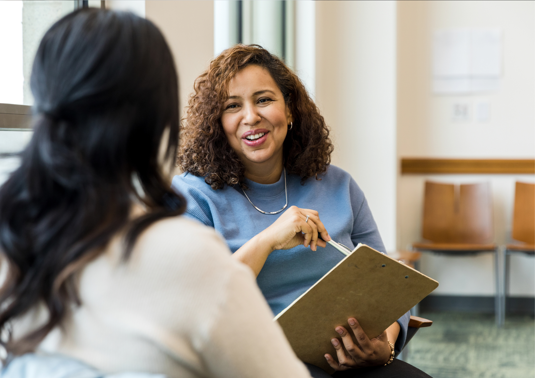 A smiling woman with curly hair holds a clipboard and pen while talking to another woman.​​​​‌﻿‍﻿​‍​‍‌‍﻿﻿‌﻿​‍‌‍‍‌‌‍‌﻿‌‍‍‌‌‍﻿‍​‍​‍​﻿‍‍​‍​‍‌﻿​﻿‌‍​‌‌‍﻿‍‌‍‍‌‌﻿‌​‌﻿‍‌​‍﻿‍‌‍‍‌‌‍﻿﻿​‍​‍​‍﻿​​‍​‍‌‍‍​‌﻿​‍‌‍‌‌‌‍‌‍​‍​‍​﻿‍‍​‍​‍‌‍‍​‌﻿‌​‌﻿‌​‌﻿​​‌﻿​﻿​﻿‍‍​‍﻿﻿​‍﻿﻿‌‍﻿‌‌‍​‌‌‍​﻿‌‍‍﻿‌‍​‌‌﻿‍‌​‍﻿‌‌‍‌﻿‌‍﻿﻿‌‍﻿﻿‌‍‌​‌﻿‌﻿‌‍‍‌‌‍﻿‍​‍﻿‍‌﻿​﻿‌‍​‌‌‍﻿‍‌‍‍‌‌﻿‌​‌﻿‍‌​‍﻿‍‌﻿​﻿‌﻿‌​‌﻿‌‌‌‍‌​‌‍‍‌‌‍﻿﻿​‍﻿﻿‌﻿​﻿‌﻿‌​‌﻿‌‌‌‍‌​‌‍‍‌‌‍﻿﻿​‍﻿﻿‌‍‍‌‌‍﻿‍‌﻿‌​‌‍‌‌‌‍﻿‍‌﻿‌​​‍﻿﻿‌‍‌‌‌‍‌​‌‍‍‌‌﻿‌​​‍﻿﻿‌‍﻿‌‌‍﻿﻿‌‍‌​‌‍‌‌​﻿﻿‌‌﻿​​‌﻿​‍‌‍‌‌‌﻿​﻿‌‍‌‌‌‍﻿‍‌﻿‌​‌‍​‌‌﻿‌​‌‍‍‌‌‍﻿﻿‌‍﻿‍​﻿‍﻿‌‍‍‌‌‍‌​​﻿﻿‌‌‍​﻿‌‍‌‍‌‍‌​‌‍​﻿​﻿​‌‌‍​‌‌‍​‍​﻿​﻿​‍﻿‌‌‍​﻿​﻿‌‌‌‍‌‌​﻿​‌​‍﻿‌​﻿‌​‌‍​﻿​﻿‌‌​﻿‌﻿​‍﻿‌‌‍​‍​﻿‍​‌‍‌​​﻿‍‌​‍﻿‌‌‍​‍​﻿‍‌​﻿‍‌​﻿‍​​﻿‍‌‌‍‌​​﻿​‍​﻿‌‍​﻿​​‌‍​‌‌‍‌​​﻿​​​﻿‍﻿‌﻿‌​‌﻿‍‌‌﻿​​‌‍‌‌​﻿﻿‌‌﻿​​‌‍﻿﻿‌﻿​﻿‌﻿‌​​﻿‍﻿‌﻿​​‌‍​‌‌﻿‌​‌‍‍​​﻿﻿‌‌‍‍‌‌‍﻿‌‌‍​‌‌‍‌﻿‌‍‌‌​‍﻿‍‌‍​‌‌‍﻿​‌﻿‌​​﻿﻿﻿‌‍​‍‌‍​‌‌﻿​﻿‌‍‌‌‌‌‌‌‌﻿​‍‌‍﻿​​﻿﻿‌‌‍‍​‌﻿‌​‌﻿‌​‌﻿​​‌﻿​﻿​‍‌‌​﻿​﻿‌​​‌​‍‌‌​﻿​‍‌​‌‍​‍‌‌​﻿​‍‌​‌‍‌‍﻿‌‌‍​‌‌‍​﻿‌‍‍﻿‌‍​‌‌﻿‍‌​‍﻿‌‌‍‌﻿‌‍﻿﻿‌‍﻿﻿‌‍‌​‌﻿‌﻿‌‍‍‌‌‍﻿‍​‍﻿‍‌﻿​﻿‌‍​‌‌‍﻿‍‌‍‍‌‌﻿‌​‌﻿‍‌​‍﻿‍‌﻿​﻿‌﻿‌​‌﻿‌‌‌‍‌​‌‍‍‌‌‍﻿﻿​‍‌‌​﻿​‍‌​‌‍‌﻿​﻿‌﻿‌​‌﻿‌‌‌‍‌​‌‍‍‌‌‍﻿﻿​‍‌‍‌‍‍‌‌‍‌​​﻿﻿‌‌‍​﻿‌‍‌‍‌‍‌​‌‍​﻿​﻿​‌‌‍​‌‌‍​‍​﻿​﻿​‍﻿‌‌‍​﻿​﻿‌‌‌‍‌‌​﻿​‌​‍﻿‌​﻿‌​‌‍​﻿​﻿‌‌​﻿‌﻿​‍﻿‌‌‍​‍​﻿‍​‌‍‌​​﻿‍‌​‍﻿‌‌‍​‍​﻿‍‌​﻿‍‌​﻿‍​​﻿‍‌‌‍‌​​﻿​‍​﻿‌‍​﻿​​‌‍​‌‌‍‌​​﻿​​​‍‌‍‌﻿‌​‌﻿‍‌‌﻿​​‌‍‌‌​﻿﻿‌‌﻿​​‌‍﻿﻿‌﻿​﻿‌﻿‌​​‍‌‍‌﻿​​‌‍​‌‌﻿‌​‌‍‍​​﻿﻿‌‌‍‍‌‌‍﻿‌‌‍​‌‌‍‌﻿‌‍‌‌​‍﻿‍‌‍​‌‌‍﻿​‌﻿‌​​‍‌‍‌﻿​​‌‍‌‌‌﻿​‍‌﻿​﻿‌﻿​​‌‍‌‌‌‍​﻿‌﻿‌​‌‍‍‌‌﻿‌‍‌‍‌‌​﻿﻿‌‌﻿​​‌﻿‌‌‌‍​‍‌‍﻿​‌‍‍‌‌﻿​﻿‌‍‍​‌‍‌‌‌‍‌​​‍​‍‌﻿﻿‌