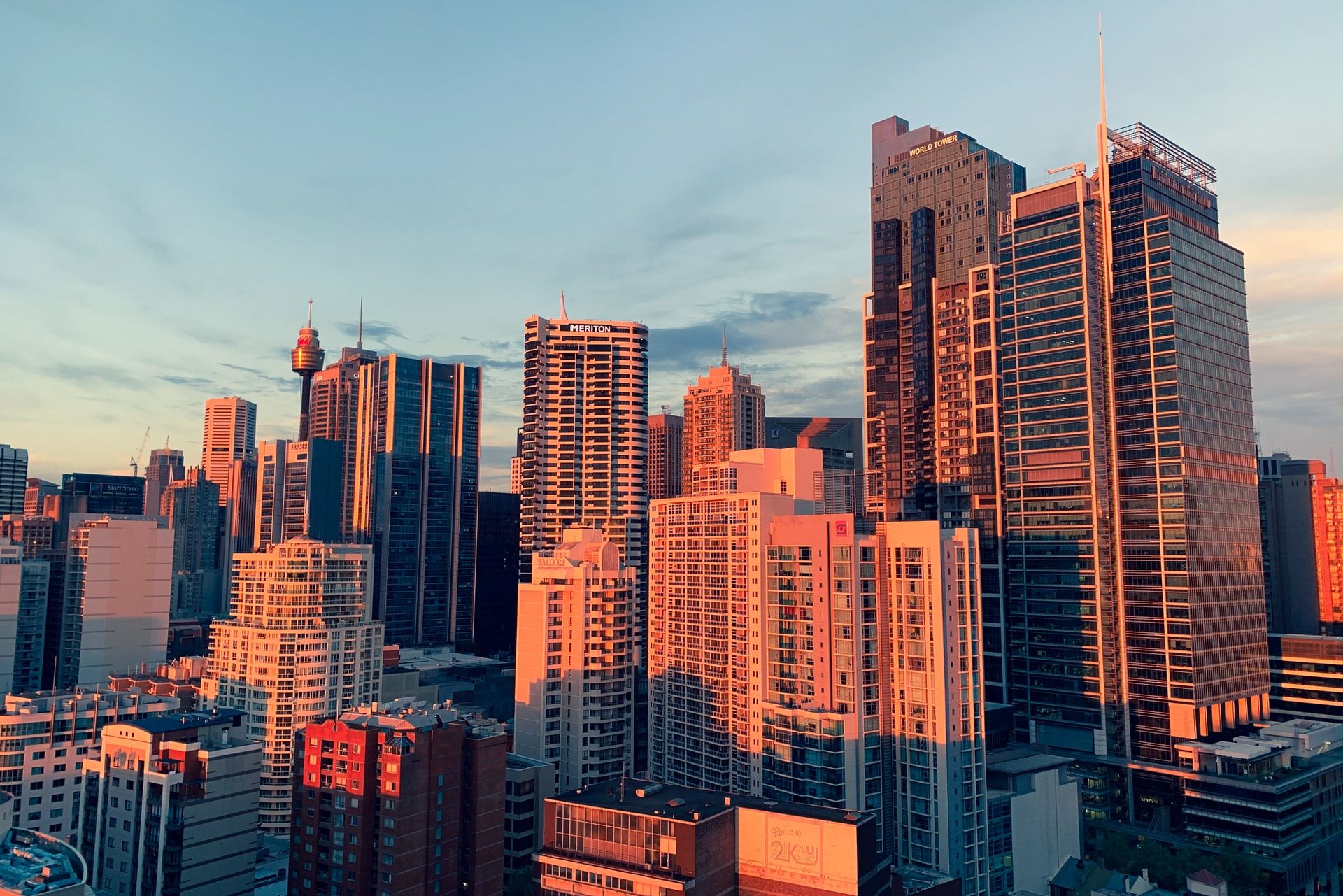 an aerial view of a city skyline at sunset .
