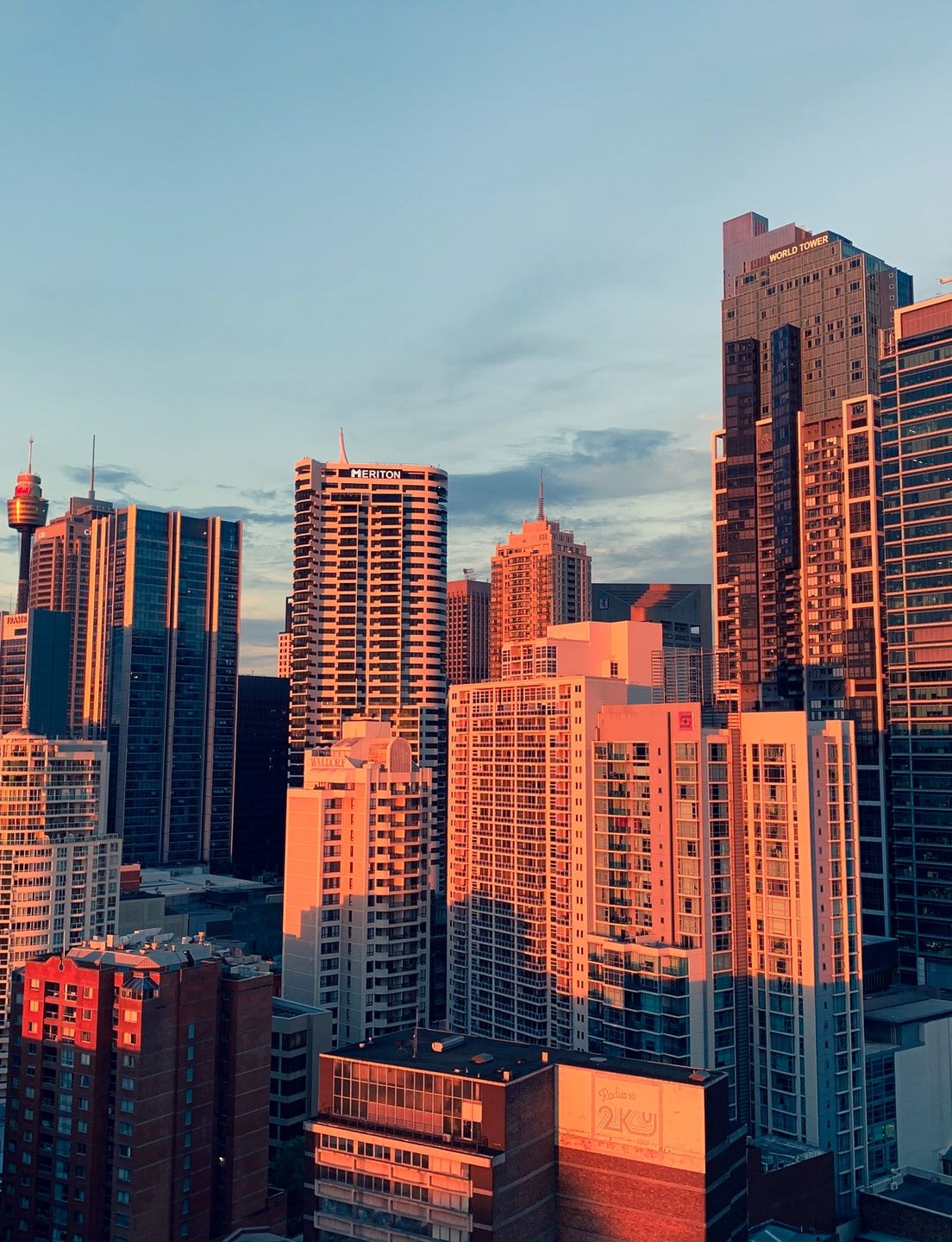 an aerial view of a city skyline at sunset .
