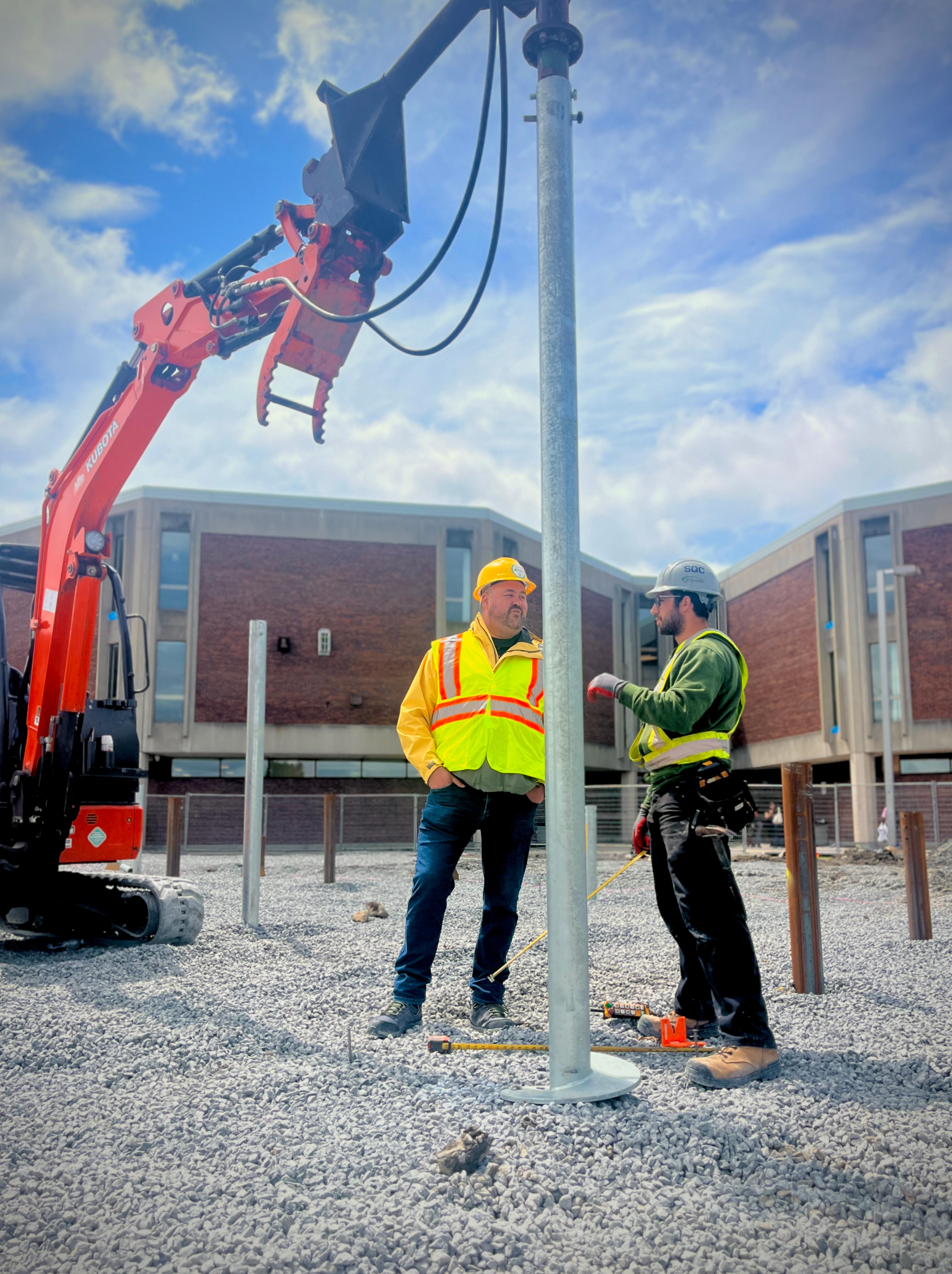Certified Postech installers at work on site