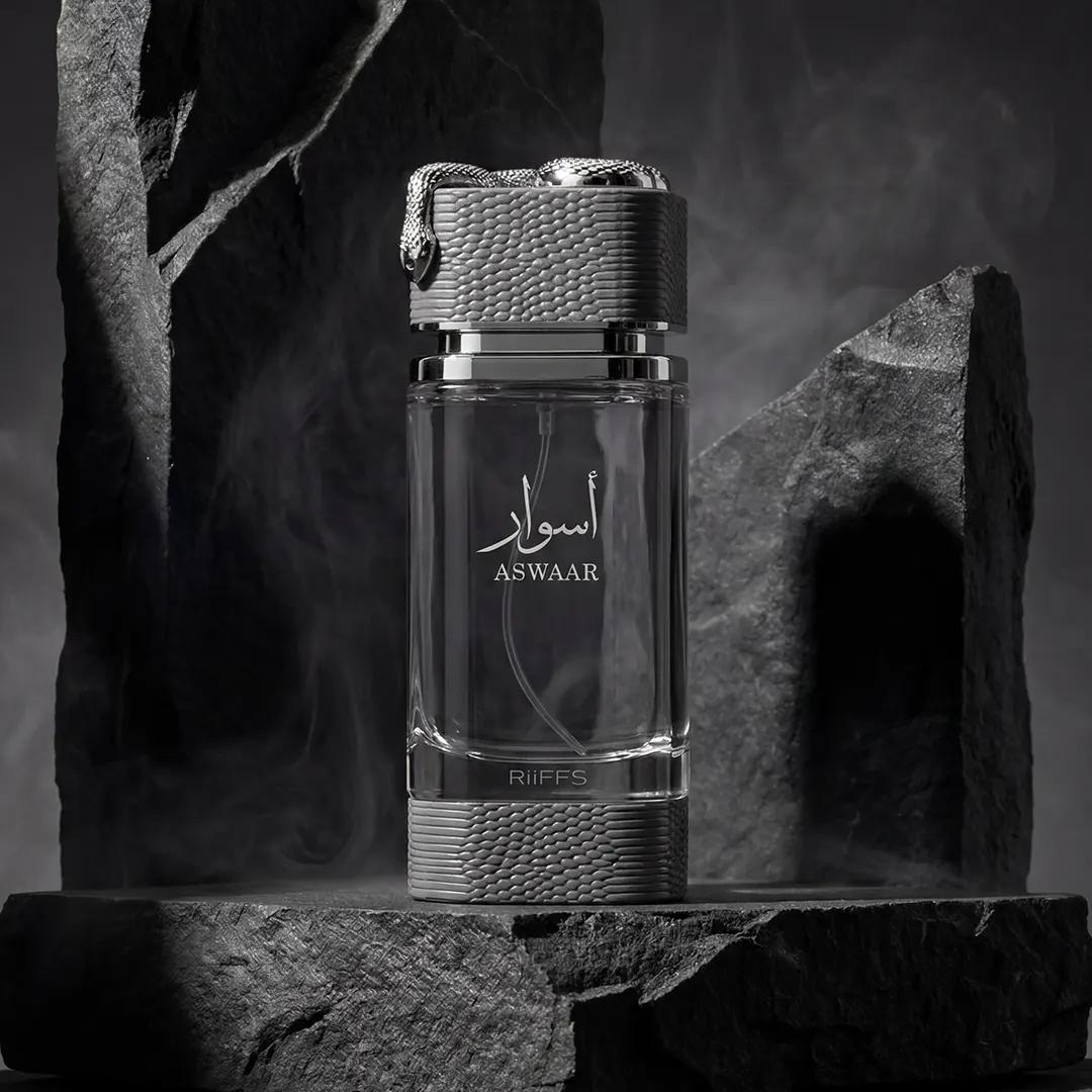 Riiffs Aswaar 100ML perfume bottle on grey stone