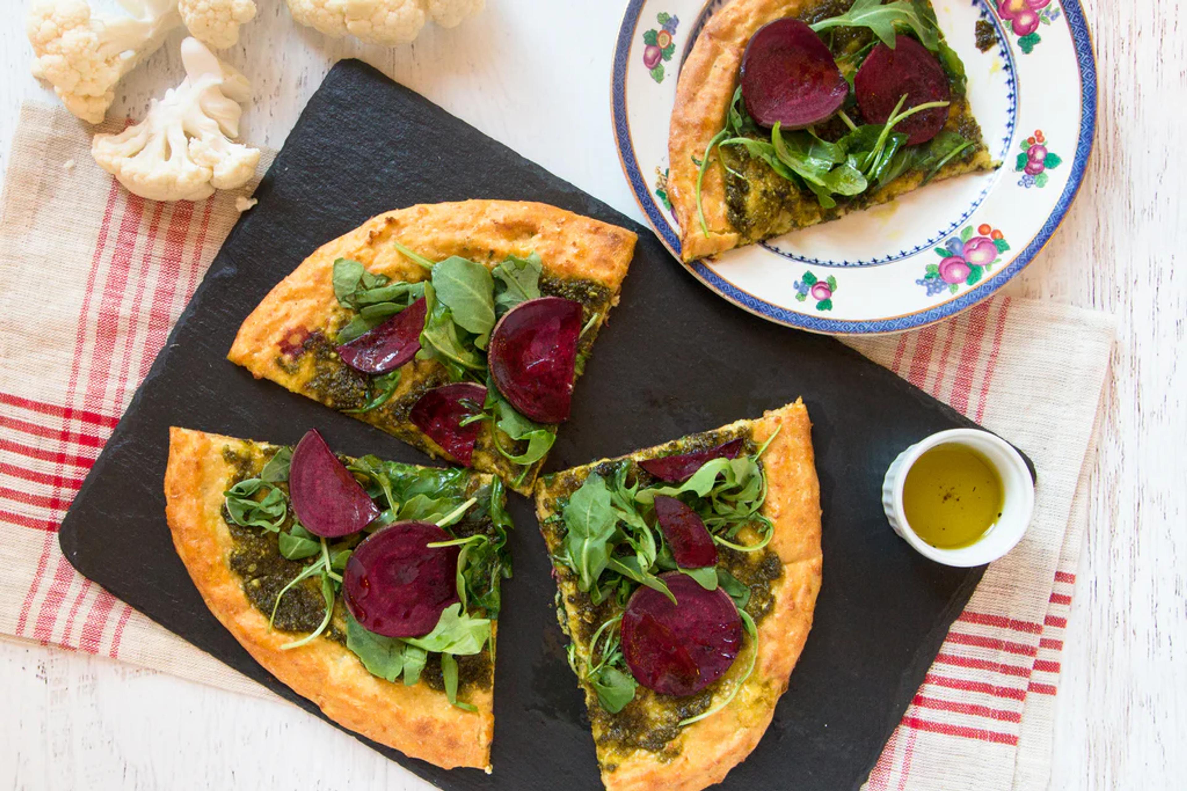 Paleo Cauliflower Pizza with Pesto & Arugula