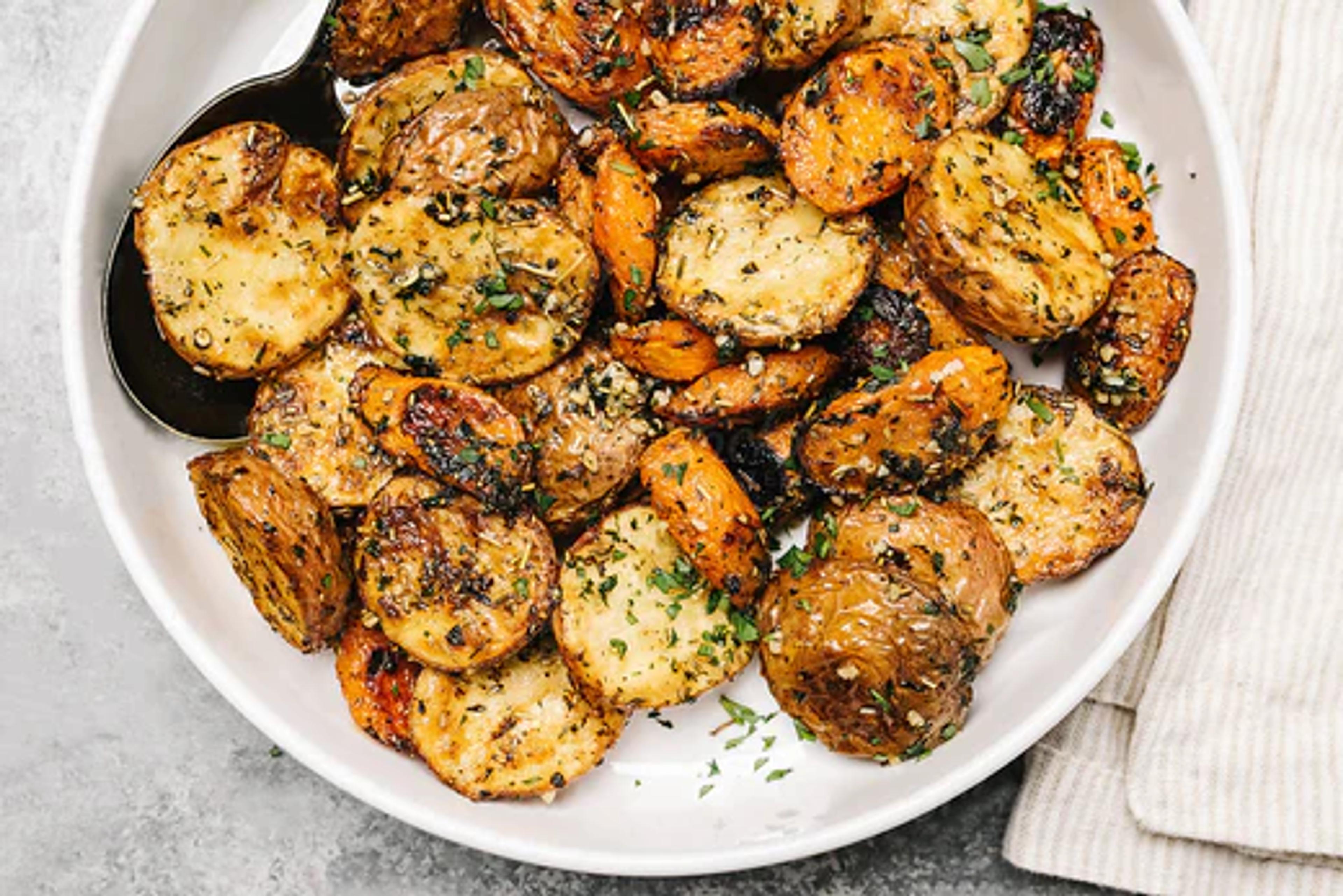 Garlic and Herb Crispy Roasted Carrots and Potatoes