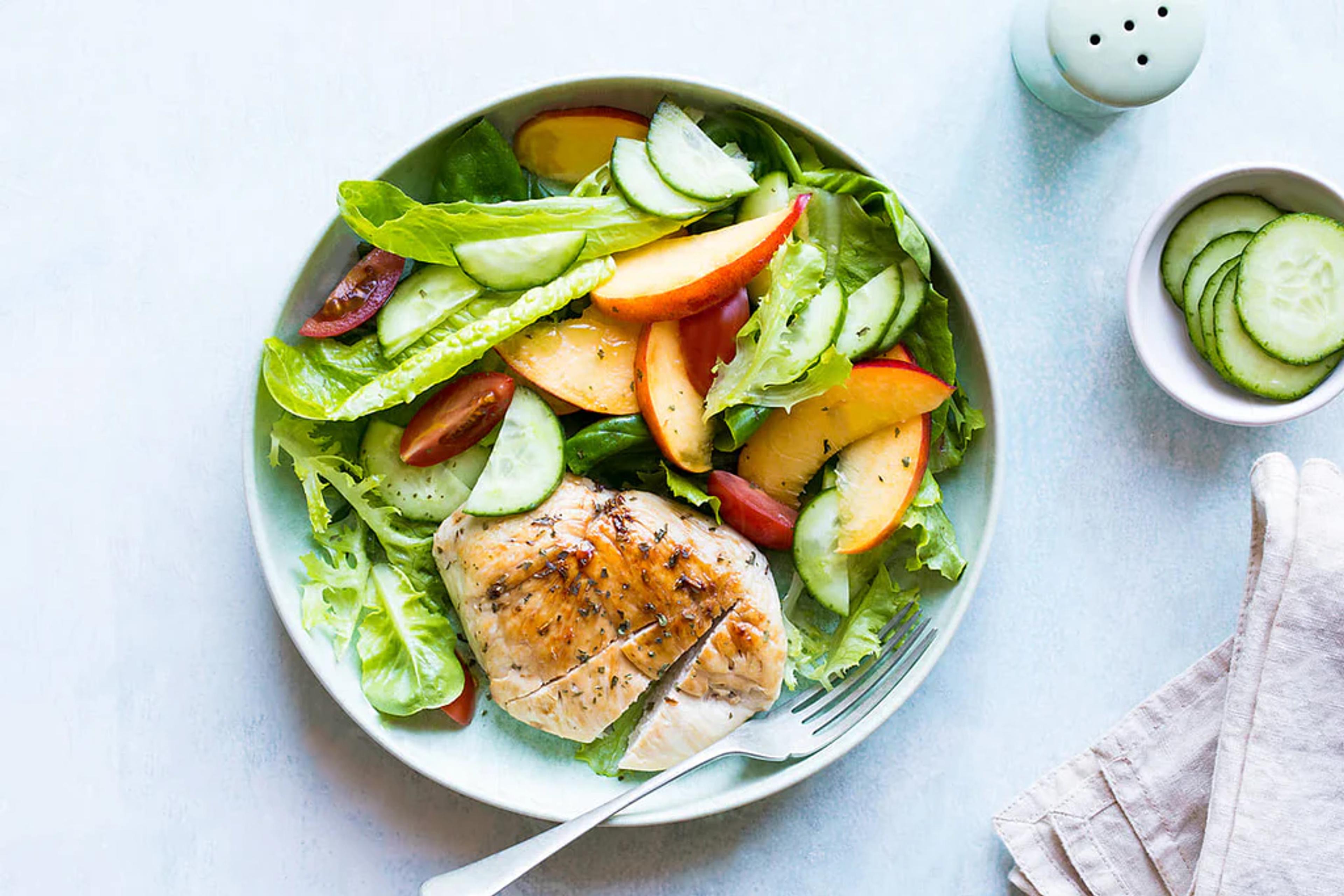 Grilled Chicken Thighs with Peach, Cucumber, Tomato Salad
