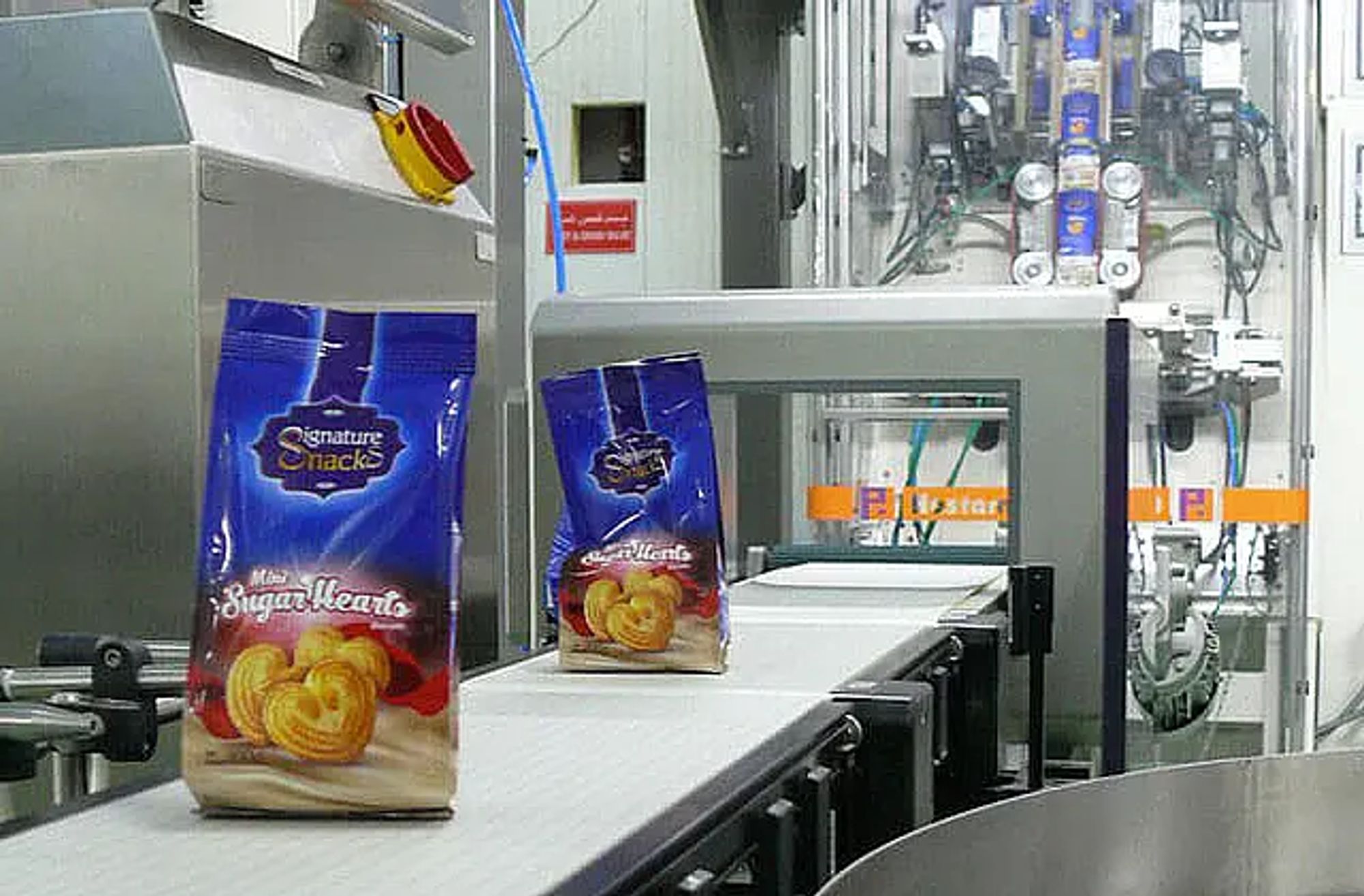 A Hastamat line packages delicate snack products into finished bags.