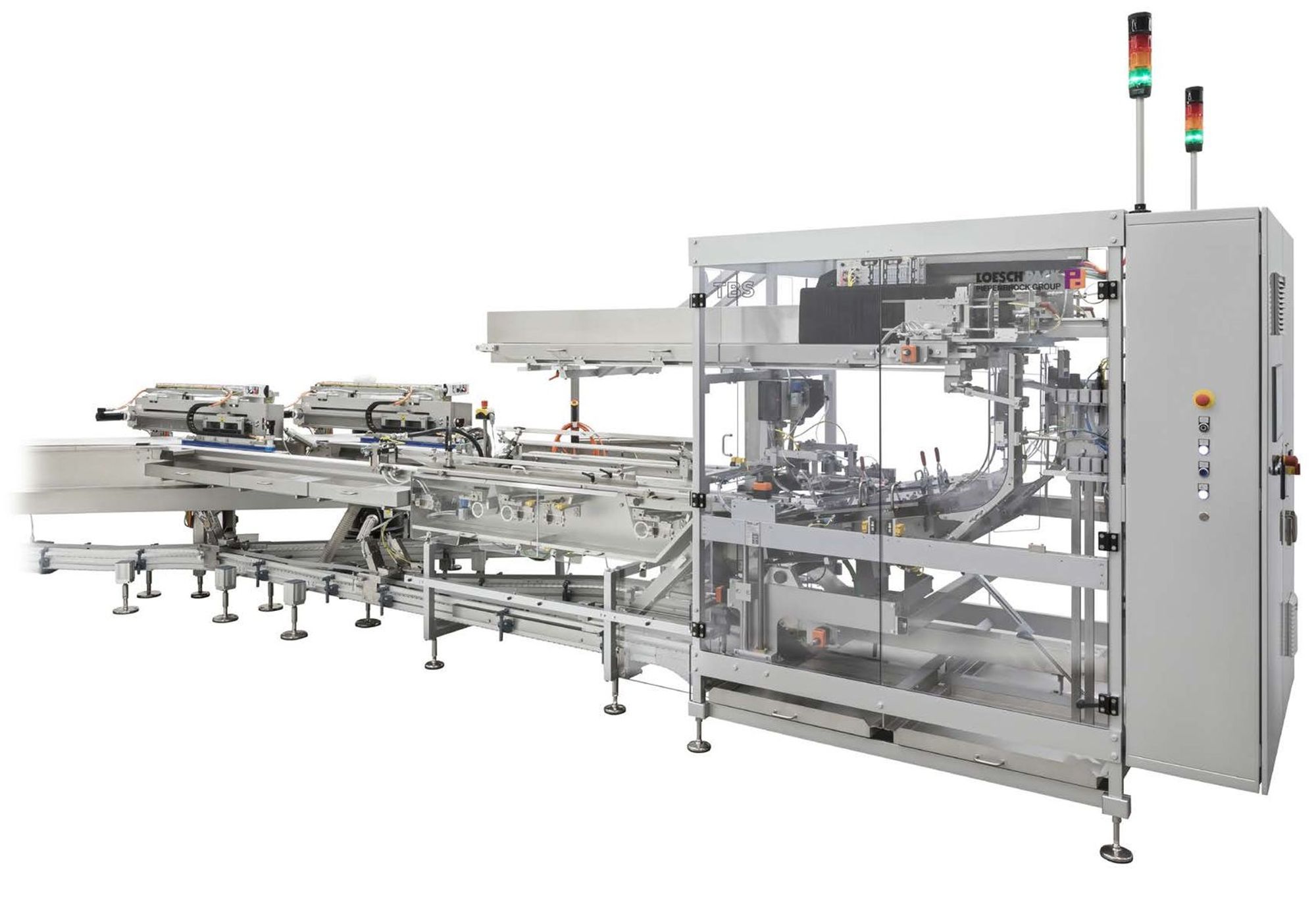A LoeschPack tray loader placing finished packs into trays at end of line.
