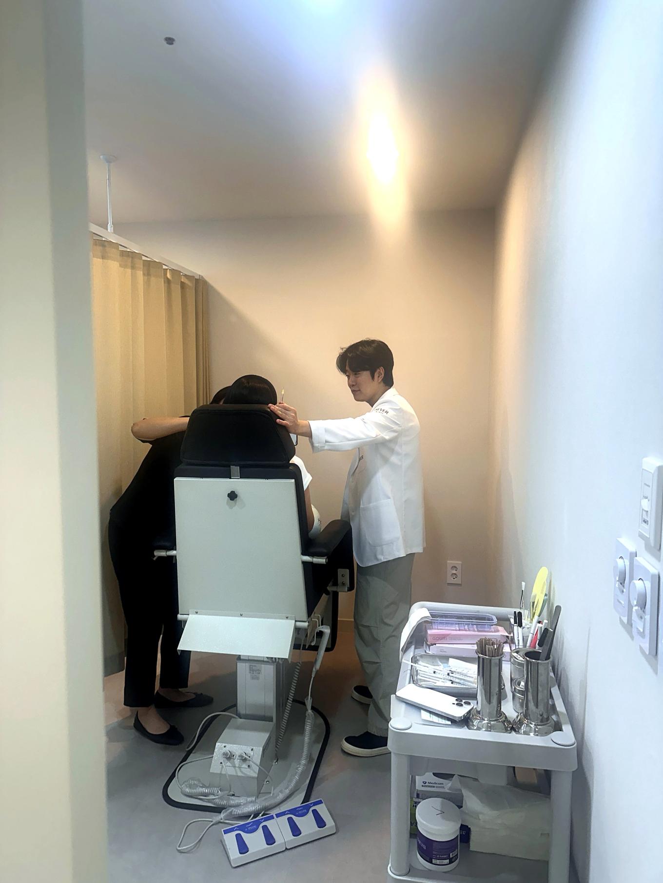 Our Myeongdong clinic's doctor tailoring treatments based on individual skin conditions