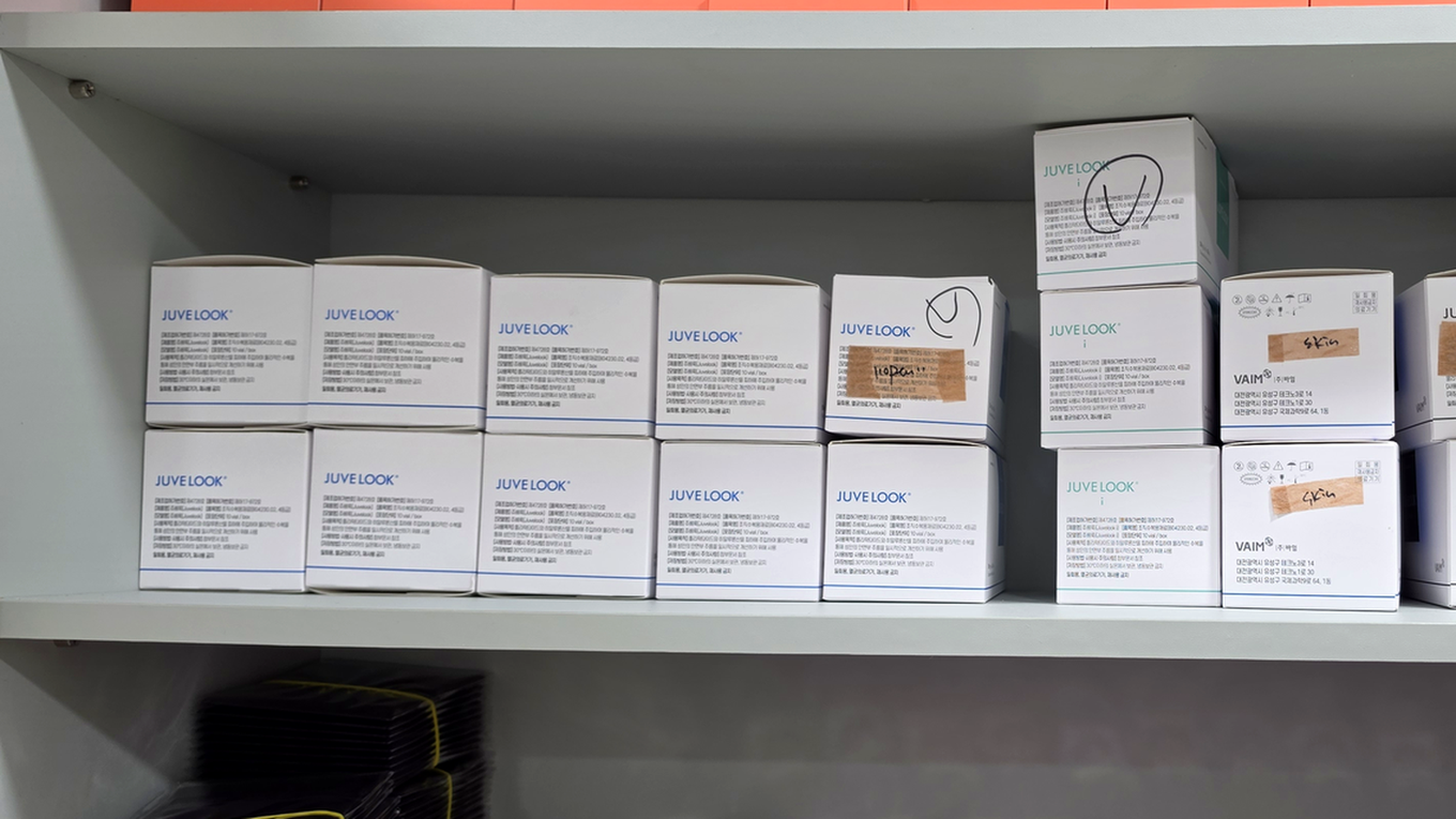 Genuine Juvelook stock stacked in the medication cabinet at our clinic in Myeongdong - once your concern is sorted, product choice comes next
