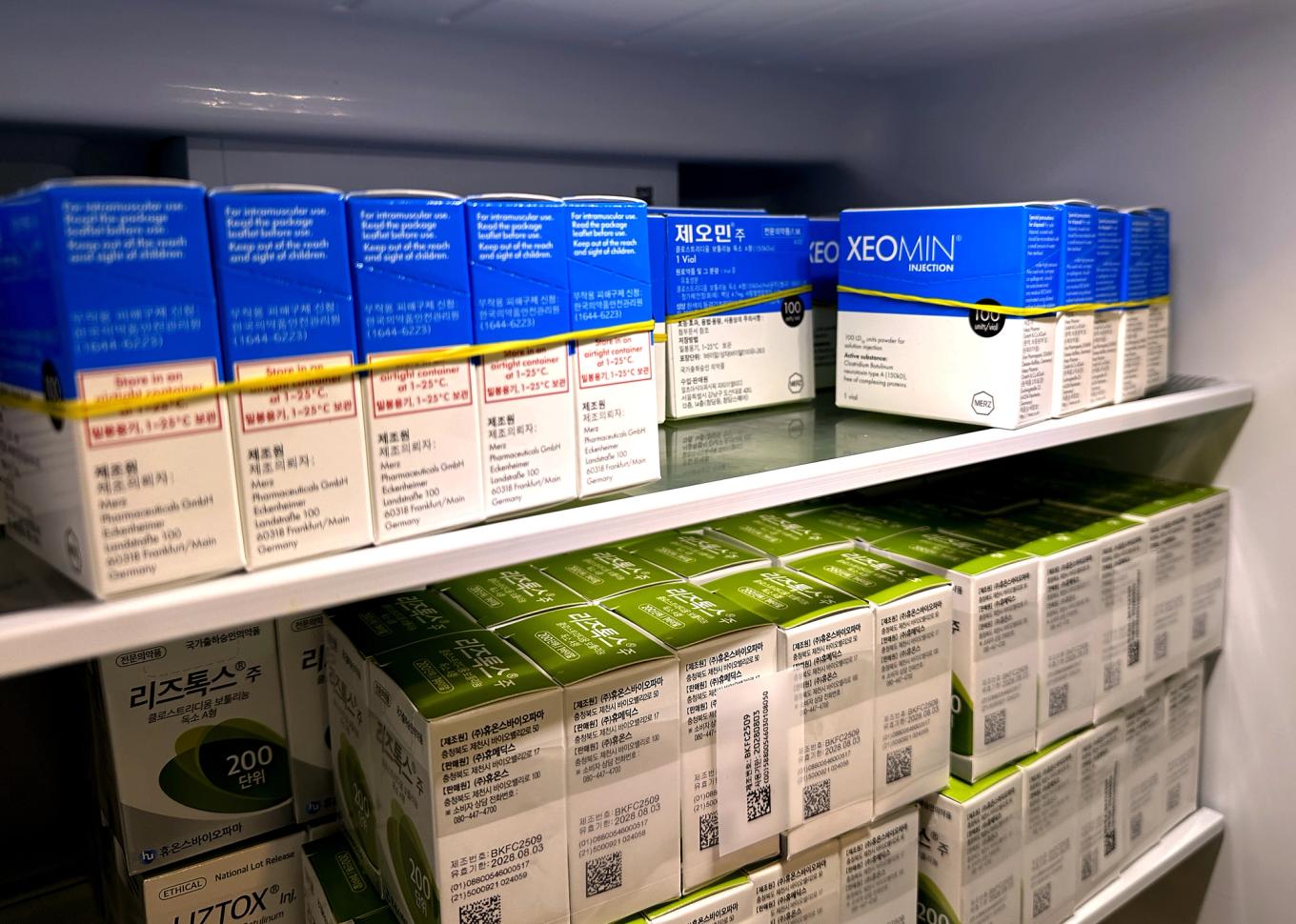 Genuine Xeomin and Liztox botulinum toxin stored in the fridge with storage temperature, expiry date and lot number visible