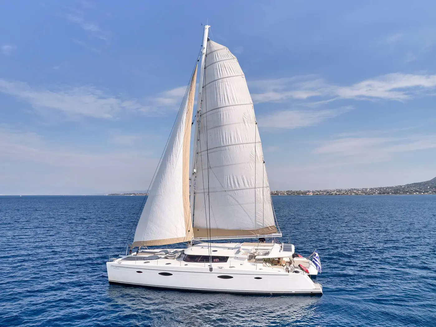Crewed sailing catamaran World's End at anchor in Greek waters, the platform for a fully kosher charter week with chef aboard