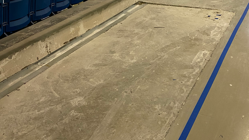 Large dent in stadium floor