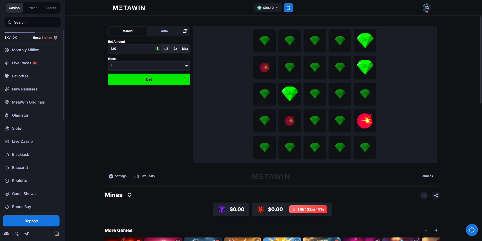 MetaWin Mines round with 3 mines, showing revealed gems and the mine that ended the round