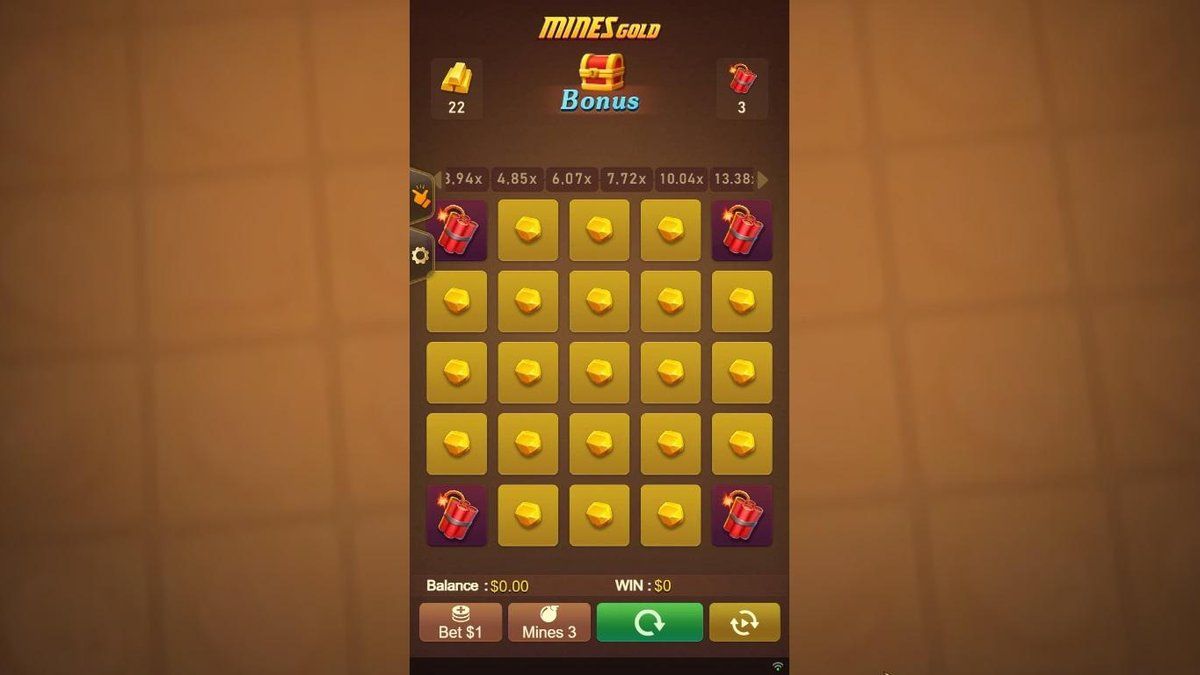 Mines Gold board with gold nuggets, dynamite and the Bonus chest above the grid