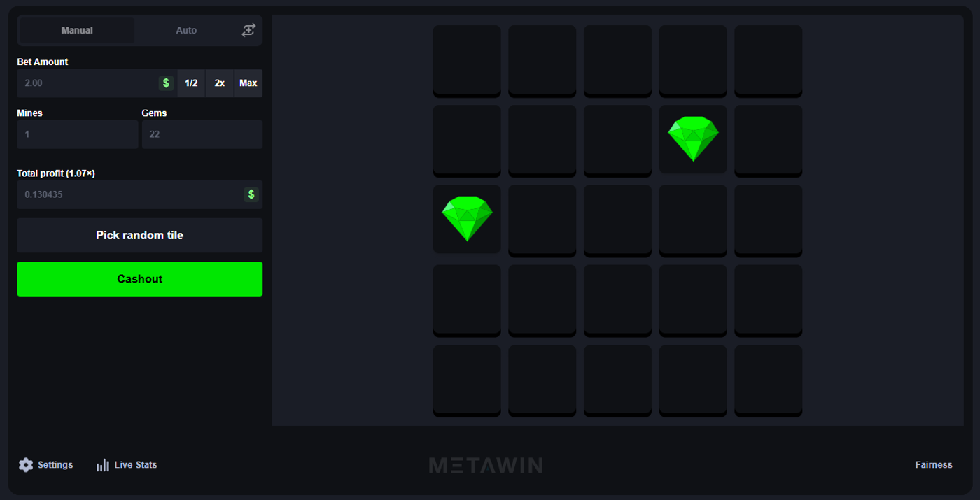MetaWin Mines gameplay showing a 5x5 grid with revealed gems and hidden mines