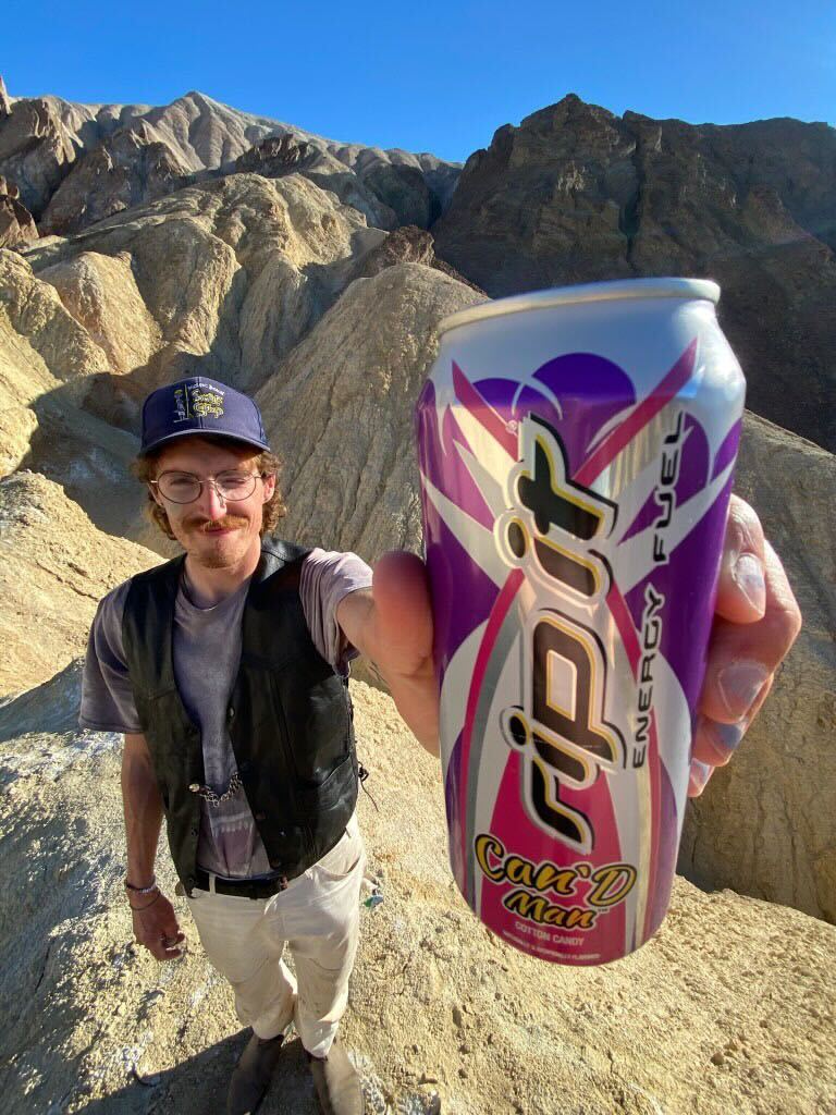 Person holding a Rip It energy drink can in a mountainous landscape.​​​​‌﻿‍﻿​‍​‍‌‍﻿﻿‌﻿​‍‌‍‍‌‌‍‌﻿‌‍‍‌‌‍﻿‍​‍​‍​﻿‍‍​‍​‍‌﻿​﻿‌‍​‌‌‍﻿‍‌‍‍‌‌﻿‌​‌﻿‍‌​‍﻿‍‌‍‍‌‌‍﻿﻿​‍​‍​‍﻿​​‍​‍‌‍‍​‌﻿​‍‌‍‌‌‌‍‌‍​‍​‍​﻿‍‍​‍​‍‌‍‍​‌﻿‌​‌﻿‌​‌﻿​​‌﻿​﻿​﻿‍‍​‍﻿﻿​‍﻿﻿‌﻿‌﻿‌﻿‌﻿‌﻿‌﻿​‍﻿‍‌﻿​‍‌‍‍‌‌﻿​​‌‍‍‌‌﻿‌​‌‍‌‌‌‍﻿‍‌‍‌‌‌﻿​‍‌‍‌﻿‌﻿‍‌​‍﻿‍‌‍​﻿‌‍﻿﻿‌‍﻿‌​‍﻿﻿‌‍‍‌‌‍﻿‍‌﻿‌​‌‍‌‌‌‍﻿‍‌﻿‌​​‍﻿﻿‌‍‌‌‌‍‌​‌‍‍‌‌﻿‌​​‍﻿﻿‌‍﻿‌‌‍﻿﻿‌‍‌​‌‍‌‌​﻿﻿‌‌﻿​​‌﻿​‍‌‍‌‌‌﻿​﻿‌‍‌‌‌‍﻿‍‌﻿‌​‌‍​‌‌﻿‌​‌‍‍‌‌‍﻿﻿‌‍﻿‍​﻿‍﻿‌‍‍‌‌‍‌​​﻿﻿‌‌‍​‌​﻿‌​​﻿​‍‌‍​‌​﻿‌﻿​﻿​​​﻿‍​​﻿‌‌​‍﻿‌​﻿​﻿​﻿‌‌​﻿​​​﻿​‍​‍﻿‌​﻿‌​​﻿​​​﻿‌​​﻿​‍​‍﻿‌‌‍​‌‌‍​‌‌‍‌‌‌‍‌‍​‍﻿‌​﻿​​​﻿​‌‌‍​‍‌‍‌‌​﻿​﻿​﻿‌​​﻿‍‌​﻿‌​‌‍​﻿​﻿‍​‌‍‌‍‌‍‌​​﻿‍﻿‌﻿‌​‌﻿‍‌‌﻿​​‌‍‌‌​﻿﻿‌‌‍﻿‌‌‍﻿﻿‌‍‌​‌﻿‌‌‌‍﻿​‌‍‌‌​﻿‍﻿‌﻿​​‌‍​‌‌﻿‌​‌‍‍​​﻿﻿‌‌‍​﻿‌‍​‌‌﻿​‍‌‍‌​‌‌​﻿‌‍​﻿‌﻿​‍‌‍﻿﻿‌‍﻿​‌‍﻿​​‍﻿‍‌﻿‌​‌‍﻿﻿‌﻿​​‌‌﻿﻿‌﻿​﻿‌‍​﻿‌﻿​‍‌‍﻿﻿‌‍﻿​‌‍﻿​​‍‌‌​﻿‌‌‌​​‍‌‌﻿﻿‌‍‍﻿‌‍‌‌‌﻿‍‌​‍‌‌​﻿​﻿‌​‌​​‍‌‌​﻿​﻿‌​‌​​‍‌‌​﻿​‍​﻿​‍​﻿​﻿‌‍‌​​﻿​‌​﻿​﻿‌‍‌‍​﻿​‌​﻿​​​﻿‌﻿‌‍​‌‌‍‌‌​﻿‍‌​﻿‍‌​‍‌‌​﻿​‍​﻿​‍​‍‌‌​﻿‌‌‌​‌​​‍﻿‍‌‍‍‌‌‍﻿‌‌‍​‌‌‍‌﻿‌‍‌‌​‍﻿‍‌‍​‌‌‍﻿​‌﻿‌​​﻿﻿﻿‌‍​‍‌‍​‌‌﻿​﻿‌‍‌‌‌‌‌‌‌﻿​‍‌‍﻿​​﻿﻿‌‌‍‍​‌﻿‌​‌﻿‌​‌﻿​​‌﻿​﻿​‍‌‌​﻿​﻿‌​​‌​‍‌‌​﻿​‍‌​‌‍​‍‌‌​﻿​‍‌​‌‍‌﻿‌﻿‌﻿‌﻿‌﻿‌﻿​‍﻿‍‌﻿​‍‌‍‍‌‌﻿​​‌‍‍‌‌﻿‌​‌‍‌‌‌‍﻿‍‌‍‌‌‌﻿​‍‌‍‌﻿‌﻿‍‌​‍﻿‍‌‍​﻿‌‍﻿﻿‌‍﻿‌​‍‌‍‌‍‍‌‌‍‌​​﻿﻿‌‌‍​‌​﻿‌​​﻿​‍‌‍​‌​﻿‌﻿​﻿​​​﻿‍​​﻿‌‌​‍﻿‌​﻿​﻿​﻿‌‌​﻿​​​﻿​‍​‍﻿‌​﻿‌​​﻿​​​﻿‌​​﻿​‍​‍﻿‌‌‍​‌‌‍​‌‌‍‌‌‌‍‌‍​‍﻿‌​﻿​​​﻿​‌‌‍​‍‌‍‌‌​﻿​﻿​﻿‌​​﻿‍‌​﻿‌​‌‍​﻿​﻿‍​‌‍‌‍‌‍‌​​‍‌‍‌﻿‌​‌﻿‍‌‌﻿​​‌‍‌‌​﻿﻿‌‌‍﻿‌‌‍﻿﻿‌‍‌​‌﻿‌‌‌‍﻿​‌‍‌‌​‍‌‍‌﻿​​‌‍​‌‌﻿‌​‌‍‍​​﻿﻿‌‌‍​﻿‌‍​‌‌﻿​‍‌‍‌​‌‌​﻿‌‍​﻿‌﻿​‍‌‍﻿﻿‌‍﻿​‌‍﻿​​‍﻿‍‌﻿‌​‌‍﻿﻿‌﻿​​‌‌﻿﻿‌﻿​﻿‌‍​﻿‌﻿​‍‌‍﻿﻿‌‍﻿​‌‍﻿​​‍‌‌​﻿‌‌‌​​‍‌‌﻿﻿‌‍‍﻿‌‍‌‌‌﻿‍‌​‍‌‌​﻿​﻿‌​‌​​‍‌‌​﻿​﻿‌​‌​​‍‌‌​﻿​‍​﻿​‍​﻿​﻿‌‍‌​​﻿​‌​﻿​﻿‌‍‌‍​﻿​‌​﻿​​​﻿‌﻿‌‍​‌‌‍‌‌​﻿‍‌​﻿‍‌​‍‌‌​﻿​‍​﻿​‍​‍‌‌​﻿‌‌‌​‌​​‍﻿‍‌‍‍‌‌‍﻿‌‌‍​‌‌‍‌﻿‌‍‌‌​‍﻿‍‌‍​‌‌‍﻿​‌﻿‌​​‍​‍‌﻿﻿‌