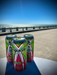 Three Melon Hi Rip It energy drink cans on a table with an ocean backdrop.​​​​‌﻿‍﻿​‍​‍‌‍﻿﻿‌﻿​‍‌‍‍‌‌‍‌﻿‌‍‍‌‌‍﻿‍​‍​‍​﻿‍‍​‍​‍‌﻿​﻿‌‍​‌‌‍﻿‍‌‍‍‌‌﻿‌​‌﻿‍‌​‍﻿‍‌‍‍‌‌‍﻿﻿​‍​‍​‍﻿​​‍​‍‌‍‍​‌﻿​‍‌‍‌‌‌‍‌‍​‍​‍​﻿‍‍​‍​‍‌‍‍​‌﻿‌​‌﻿‌​‌﻿​​‌﻿​﻿​﻿‍‍​‍﻿﻿​‍﻿﻿‌﻿‌﻿‌﻿‌﻿‌﻿‌﻿​‍﻿‍‌﻿​‍‌‍‍‌‌﻿​​‌‍‍‌‌﻿‌​‌‍‌‌‌‍﻿‍‌‍‌‌‌﻿​‍‌‍‌﻿‌﻿‍‌​‍﻿‍‌‍​﻿‌‍﻿﻿‌‍﻿‌​‍﻿﻿‌‍‍‌‌‍﻿‍‌﻿‌​‌‍‌‌‌‍﻿‍‌﻿‌​​‍﻿﻿‌‍‌‌‌‍‌​‌‍‍‌‌﻿‌​​‍﻿﻿‌‍﻿‌‌‍﻿﻿‌‍‌​‌‍‌‌​﻿﻿‌‌﻿​​‌﻿​‍‌‍‌‌‌﻿​﻿‌‍‌‌‌‍﻿‍‌﻿‌​‌‍​‌‌﻿‌​‌‍‍‌‌‍﻿﻿‌‍﻿‍​﻿‍﻿‌‍‍‌‌‍‌​​﻿﻿‌‌﻿​​‌﻿​‍‌‍﻿﻿‌‍‌​‌﻿‌‌‌‍​﻿‌﻿‌​‌‌‌​‌‍‌‌‌‍﻿‌‌﻿​​‌‍﻿​‌‍​‌‌﻿‌​‌‍‌‌​﻿‍﻿‌﻿‌​‌﻿‍‌‌﻿​​‌‍‌‌​﻿﻿‌‌﻿​​‌﻿​‍‌‍﻿﻿‌‍‌​‌﻿‌‌‌‍​﻿‌﻿‌​‌‌‌​‌‍‌‌‌‍﻿‌‌﻿​​‌‍﻿​‌‍​‌‌﻿‌​‌‍‌‌​﻿‍﻿‌﻿​​‌‍​‌‌﻿‌​‌‍‍​​﻿﻿‌‌‍‍‌‌‍﻿‌‌‍​‌‌‍‌﻿‌‍‌‌‌﻿​﻿‌‌﻿﻿‌﻿​‍‌‍‍‌‌‍‌﻿‌‍‍​‌﻿‌​​‍‌‌​﻿‌‌‌​​‍‌‌﻿﻿‌‍‍﻿‌‍‌‌‌﻿‍‌​‍‌‌​﻿​﻿‌​‌​​‍‌‌​﻿​﻿‌​‌​​‍‌‌​﻿​‍​﻿​‍​﻿‌​​﻿‌‍​﻿‌​‌‍‌‌​﻿‌‌​﻿‍‌​﻿​﻿‌‍‌​‌‍‌​‌‍‌‌​﻿​‍​﻿​﻿​‍‌‌​﻿​‍​﻿​‍​‍‌‌​﻿‌‌‌​‌​​‍﻿‍‌‍‍‌‌‍﻿‌‌‍​‌‌‍‌﻿‌‍‌‌​‍﻿‍‌‍​‌‌‍﻿​‌﻿‌​​﻿﻿﻿‌‍​‍‌‍​‌‌﻿​﻿‌‍‌‌‌‌‌‌‌﻿​‍‌‍﻿​​﻿﻿‌‌‍‍​‌﻿‌​‌﻿‌​‌﻿​​‌﻿​﻿​‍‌‌​﻿​﻿‌​​‌​‍‌‌​﻿​‍‌​‌‍​‍‌‌​﻿​‍‌​‌‍‌﻿‌﻿‌﻿‌﻿‌﻿‌﻿​‍﻿‍‌﻿​‍‌‍‍‌‌﻿​​‌‍‍‌‌﻿‌​‌‍‌‌‌‍﻿‍‌‍‌‌‌﻿​‍‌‍‌﻿‌﻿‍‌​‍﻿‍‌‍​﻿‌‍﻿﻿‌‍﻿‌​‍‌‍‌‍‍‌‌‍‌​​﻿﻿‌‌﻿​​‌﻿​‍‌‍﻿﻿‌‍‌​‌﻿‌‌‌‍​﻿‌﻿‌​‌‌‌​‌‍‌‌‌‍﻿‌‌﻿​​‌‍﻿​‌‍​‌‌﻿‌​‌‍‌‌​‍‌‍‌﻿‌​‌﻿‍‌‌﻿​​‌‍‌‌​﻿﻿‌‌﻿​​‌﻿​‍‌‍﻿﻿‌‍‌​‌﻿‌‌‌‍​﻿‌﻿‌​‌‌‌​‌‍‌‌‌‍﻿‌‌﻿​​‌‍﻿​‌‍​‌‌﻿‌​‌‍‌‌​‍‌‍‌﻿​​‌‍​‌‌﻿‌​‌‍‍​​﻿﻿‌‌‍‍‌‌‍﻿‌‌‍​‌‌‍‌﻿‌‍‌‌‌﻿​﻿‌‌﻿﻿‌﻿​‍‌‍‍‌‌‍‌﻿‌‍‍​‌﻿‌​​‍‌‌​﻿‌‌‌​​‍‌‌﻿﻿‌‍‍﻿‌‍‌‌‌﻿‍‌​‍‌‌​﻿​﻿‌​‌​​‍‌‌​﻿​﻿‌​‌​​‍‌‌​﻿​‍​﻿​‍​﻿‌​​﻿‌‍​﻿‌​‌‍‌‌​﻿‌‌​﻿‍‌​﻿​﻿‌‍‌​‌‍‌​‌‍‌‌​﻿​‍​﻿​﻿​‍‌‌​﻿​‍​﻿​‍​‍‌‌​﻿‌‌‌​‌​​‍﻿‍‌‍‍‌‌‍﻿‌‌‍​‌‌‍‌﻿‌‍‌‌​‍﻿‍‌‍​‌‌‍﻿​‌﻿‌​​‍​‍‌﻿﻿‌