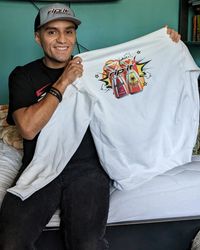 A smiling man sitting indoors, holding up a white hoodie with energy drink branding.​​​​‌﻿‍﻿​‍​‍‌‍﻿﻿‌﻿​‍‌‍‍‌‌‍‌﻿‌‍‍‌‌‍﻿‍​‍​‍​﻿‍‍​‍​‍‌﻿​﻿‌‍​‌‌‍﻿‍‌‍‍‌‌﻿‌​‌﻿‍‌​‍﻿‍‌‍‍‌‌‍﻿﻿​‍​‍​‍﻿​​‍​‍‌‍‍​‌﻿​‍‌‍‌‌‌‍‌‍​‍​‍​﻿‍‍​‍​‍‌‍‍​‌﻿‌​‌﻿‌​‌﻿​​‌﻿​﻿​﻿‍‍​‍﻿﻿​‍﻿﻿‌﻿‌﻿‌﻿‌﻿‌﻿‌﻿​‍﻿‍‌﻿​‍‌‍‍‌‌﻿​​‌‍‍‌‌﻿‌​‌‍‌‌‌‍﻿‍‌‍‌‌‌﻿​‍‌‍‌﻿‌﻿‍‌​‍﻿‍‌‍​﻿‌‍﻿﻿‌‍﻿‌​‍﻿﻿‌‍‍‌‌‍﻿‍‌﻿‌​‌‍‌‌‌‍﻿‍‌﻿‌​​‍﻿﻿‌‍‌‌‌‍‌​‌‍‍‌‌﻿‌​​‍﻿﻿‌‍﻿‌‌‍﻿﻿‌‍‌​‌‍‌‌​﻿﻿‌‌﻿​​‌﻿​‍‌‍‌‌‌﻿​﻿‌‍‌‌‌‍﻿‍‌﻿‌​‌‍​‌‌﻿‌​‌‍‍‌‌‍﻿﻿‌‍﻿‍​﻿‍﻿‌‍‍‌‌‍‌​​﻿﻿‌‌﻿​​‌﻿​‍‌‍﻿﻿‌‍‌​‌﻿‌‌‌‍​﻿‌﻿‌​‌‌‌​‌‍‌‌‌‍﻿‌‌﻿​​‌‍﻿​‌‍​‌‌﻿‌​‌‍‌‌​﻿‍﻿‌﻿‌​‌﻿‍‌‌﻿​​‌‍‌‌​﻿﻿‌‌﻿​​‌﻿​‍‌‍﻿﻿‌‍‌​‌﻿‌‌‌‍​﻿‌﻿‌​‌‌‌​‌‍‌‌‌‍﻿‌‌﻿​​‌‍﻿​‌‍​‌‌﻿‌​‌‍‌‌​﻿‍﻿‌﻿​​‌‍​‌‌﻿‌​‌‍‍​​﻿﻿‌‌‍‍‌‌‍﻿‌‌‍​‌‌‍‌﻿‌‍‌‌‌﻿​﻿​‍‌‌​﻿‌‌‌​​‍‌‌﻿﻿‌‍‍﻿‌‍‌‌‌﻿‍‌​‍‌‌​﻿​﻿‌​‌​​‍‌‌​﻿​﻿‌​‌​​‍‌‌​﻿​‍​﻿​‍‌‍‌​​﻿‌​​﻿​‍​﻿‌﻿​﻿‍​​﻿‌​‌‍​‍​﻿‌﻿‌‍​‍​﻿‍‌​﻿‌​​﻿​‌‌‍‌‍‌‍‌​​﻿​‍​﻿‌​‌‍​﻿​﻿‌‌‌‍‌‍​﻿‍‌‌‍‌‍‌‍​‌​﻿​‌​﻿​​​﻿‌‌​﻿​‍​﻿‌﻿‌‍‌‍​﻿​‍‌‍​‌​﻿​‌​﻿​​​‍‌‌​﻿​‍​﻿​‍​‍‌‌​﻿‌‌‌​‌​​‍﻿‍‌‍‍‌‌‍﻿‌‌‍​‌‌‍‌﻿‌‍‌‌​‍﻿‍‌‍​‌‌‍﻿​‌﻿‌​​﻿﻿﻿‌‍​‍‌‍​‌‌﻿​﻿‌‍‌‌‌‌‌‌‌﻿​‍‌‍﻿​​﻿﻿‌‌‍‍​‌﻿‌​‌﻿‌​‌﻿​​‌﻿​﻿​‍‌‌​﻿​﻿‌​​‌​‍‌‌​﻿​‍‌​‌‍​‍‌‌​﻿​‍‌​‌‍‌﻿‌﻿‌﻿‌﻿‌﻿‌﻿​‍﻿‍‌﻿​‍‌‍‍‌‌﻿​​‌‍‍‌‌﻿‌​‌‍‌‌‌‍﻿‍‌‍‌‌‌﻿​‍‌‍‌﻿‌﻿‍‌​‍﻿‍‌‍​﻿‌‍﻿﻿‌‍﻿‌​‍‌‍‌‍‍‌‌‍‌​​﻿﻿‌‌﻿​​‌﻿​‍‌‍﻿﻿‌‍‌​‌﻿‌‌‌‍​﻿‌﻿‌​‌‌‌​‌‍‌‌‌‍﻿‌‌﻿​​‌‍﻿​‌‍​‌‌﻿‌​‌‍‌‌​‍‌‍‌﻿‌​‌﻿‍‌‌﻿​​‌‍‌‌​﻿﻿‌‌﻿​​‌﻿​‍‌‍﻿﻿‌‍‌​‌﻿‌‌‌‍​﻿‌﻿‌​‌‌‌​‌‍‌‌‌‍﻿‌‌﻿​​‌‍﻿​‌‍​‌‌﻿‌​‌‍‌‌​‍‌‍‌﻿​​‌‍​‌‌﻿‌​‌‍‍​​﻿﻿‌‌‍‍‌‌‍﻿‌‌‍​‌‌‍‌﻿‌‍‌‌‌﻿​﻿​‍‌‌​﻿‌‌‌​​‍‌‌﻿﻿‌‍‍﻿‌‍‌‌‌﻿‍‌​‍‌‌​﻿​﻿‌​‌​​‍‌‌​﻿​﻿‌​‌​​‍‌‌​﻿​‍​﻿​‍‌‍‌​​﻿‌​​﻿​‍​﻿‌﻿​﻿‍​​﻿‌​‌‍​‍​﻿‌﻿‌‍​‍​﻿‍‌​﻿‌​​﻿​‌‌‍‌‍‌‍‌​​﻿​‍​﻿‌​‌‍​﻿​﻿‌‌‌‍‌‍​﻿‍‌‌‍‌‍‌‍​‌​﻿​‌​﻿​​​﻿‌‌​﻿​‍​﻿‌﻿‌‍‌‍​﻿​‍‌‍​‌​﻿​‌​﻿​​​‍‌‌​﻿​‍​﻿​‍​‍‌‌​﻿‌‌‌​‌​​‍﻿‍‌‍‍‌‌‍﻿‌‌‍​‌‌‍‌﻿‌‍‌‌​‍﻿‍‌‍​‌‌‍﻿​‌﻿‌​​‍​‍‌﻿﻿‌