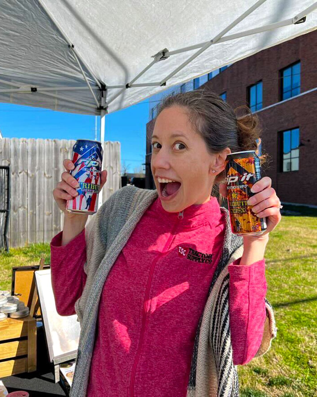 A woman smiling and holding two energy drink cans at an outdoor stand.​​​​‌﻿‍﻿​‍​‍‌‍﻿﻿‌﻿​‍‌‍‍‌‌‍‌﻿‌‍‍‌‌‍﻿‍​‍​‍​﻿‍‍​‍​‍‌﻿​﻿‌‍​‌‌‍﻿‍‌‍‍‌‌﻿‌​‌﻿‍‌​‍﻿‍‌‍‍‌‌‍﻿﻿​‍​‍​‍﻿​​‍​‍‌‍‍​‌﻿​‍‌‍‌‌‌‍‌‍​‍​‍​﻿‍‍​‍​‍‌‍‍​‌﻿‌​‌﻿‌​‌﻿​​‌﻿​﻿​﻿‍‍​‍﻿﻿​‍﻿﻿‌﻿‌﻿‌﻿‌﻿‌﻿‌﻿​‍﻿‍‌﻿​‍‌‍‍‌‌﻿​​‌‍‍‌‌﻿‌​‌‍‌‌‌‍﻿‍‌‍‌‌‌﻿​‍‌‍‌﻿‌﻿‍‌​‍﻿‍‌‍​﻿‌‍﻿﻿‌‍﻿‌​‍﻿﻿‌‍‍‌‌‍﻿‍‌﻿‌​‌‍‌‌‌‍﻿‍‌﻿‌​​‍﻿﻿‌‍‌‌‌‍‌​‌‍‍‌‌﻿‌​​‍﻿﻿‌‍﻿‌‌‍﻿﻿‌‍‌​‌‍‌‌​﻿﻿‌‌﻿​​‌﻿​‍‌‍‌‌‌﻿​﻿‌‍‌‌‌‍﻿‍‌﻿‌​‌‍​‌‌﻿‌​‌‍‍‌‌‍﻿﻿‌‍﻿‍​﻿‍﻿‌‍‍‌‌‍‌​​﻿﻿‌‌‍​‌​﻿‌​​﻿​‍‌‍​‌​﻿‌﻿​﻿​​​﻿‍​​﻿‌‌​‍﻿‌​﻿​﻿​﻿‌‌​﻿​​​﻿​‍​‍﻿‌​﻿‌​​﻿​​​﻿‌​​﻿​‍​‍﻿‌‌‍​‌‌‍​‌‌‍‌‌‌‍‌‍​‍﻿‌​﻿​​​﻿​‌‌‍​‍‌‍‌‌​﻿​﻿​﻿‌​​﻿‍‌​﻿‌​‌‍​﻿​﻿‍​‌‍‌‍‌‍‌​​﻿‍﻿‌﻿‌​‌﻿‍‌‌﻿​​‌‍‌‌​﻿﻿‌‌‍﻿‌‌‍﻿﻿‌‍‌​‌﻿‌‌‌‍﻿​‌‍‌‌​﻿‍﻿‌﻿​​‌‍​‌‌﻿‌​‌‍‍​​﻿﻿‌‌‍​﻿‌‍​‌‌﻿​‍‌‍‌​‌‌​﻿‌‍​﻿‌﻿​‍‌‍﻿﻿‌‍﻿​‌‍﻿​​‍﻿‍‌‍​‍‌‍﻿﻿‌﻿‌​‌﻿‌​‌‍﻿﻿‌‍﻿‌‌‌﻿﻿‌﻿​﻿‌‍​﻿‌﻿​‍‌‍﻿﻿‌‍﻿​‌‍﻿​​‍‌‌​﻿‌‌‌​​‍‌‌﻿﻿‌‍‍﻿‌‍‌‌‌﻿‍‌​‍‌‌​﻿​﻿‌​‌​​‍‌‌​﻿​﻿‌​‌​​‍‌‌​﻿​‍​﻿​‍‌‍​‍​﻿​‍‌‍​‌​﻿‌​‌‍​‌​﻿​﻿​﻿​​​﻿‌‍‌‍​‍​﻿​‌​﻿‌﻿​﻿‍‌​‍‌‌​﻿​‍​﻿​‍​‍‌‌​﻿‌‌‌​‌​​‍﻿‍‌‍‍‌‌‍﻿‌‌‍​‌‌‍‌﻿‌‍‌‌​‍﻿‍‌‍​‌‌‍﻿​‌﻿‌​​﻿﻿﻿‌‍​‍‌‍​‌‌﻿​﻿‌‍‌‌‌‌‌‌‌﻿​‍‌‍﻿​​﻿﻿‌‌‍‍​‌﻿‌​‌﻿‌​‌﻿​​‌﻿​﻿​‍‌‌​﻿​﻿‌​​‌​‍‌‌​﻿​‍‌​‌‍​‍‌‌​﻿​‍‌​‌‍‌﻿‌﻿‌﻿‌﻿‌﻿‌﻿​‍﻿‍‌﻿​‍‌‍‍‌‌﻿​​‌‍‍‌‌﻿‌​‌‍‌‌‌‍﻿‍‌‍‌‌‌﻿​‍‌‍‌﻿‌﻿‍‌​‍﻿‍‌‍​﻿‌‍﻿﻿‌‍﻿‌​‍‌‍‌‍‍‌‌‍‌​​﻿﻿‌‌‍​‌​﻿‌​​﻿​‍‌‍​‌​﻿‌﻿​﻿​​​﻿‍​​﻿‌‌​‍﻿‌​﻿​﻿​﻿‌‌​﻿​​​﻿​‍​‍﻿‌​﻿‌​​﻿​​​﻿‌​​﻿​‍​‍﻿‌‌‍​‌‌‍​‌‌‍‌‌‌‍‌‍​‍﻿‌​﻿​​​﻿​‌‌‍​‍‌‍‌‌​﻿​﻿​﻿‌​​﻿‍‌​﻿‌​‌‍​﻿​﻿‍​‌‍‌‍‌‍‌​​‍‌‍‌﻿‌​‌﻿‍‌‌﻿​​‌‍‌‌​﻿﻿‌‌‍﻿‌‌‍﻿﻿‌‍‌​‌﻿‌‌‌‍﻿​‌‍‌‌​‍‌‍‌﻿​​‌‍​‌‌﻿‌​‌‍‍​​﻿﻿‌‌‍​﻿‌‍​‌‌﻿​‍‌‍‌​‌‌​﻿‌‍​﻿‌﻿​‍‌‍﻿﻿‌‍﻿​‌‍﻿​​‍﻿‍‌‍​‍‌‍﻿﻿‌﻿‌​‌﻿‌​‌‍﻿﻿‌‍﻿‌‌‌﻿﻿‌﻿​﻿‌‍​﻿‌﻿​‍‌‍﻿﻿‌‍﻿​‌‍﻿​​‍‌‌​﻿‌‌‌​​‍‌‌﻿﻿‌‍‍﻿‌‍‌‌‌﻿‍‌​‍‌‌​﻿​﻿‌​‌​​‍‌‌​﻿​﻿‌​‌​​‍‌‌​﻿​‍​﻿​‍‌‍​‍​﻿​‍‌‍​‌​﻿‌​‌‍​‌​﻿​﻿​﻿​​​﻿‌‍‌‍​‍​﻿​‌​﻿‌﻿​﻿‍‌​‍‌‌​﻿​‍​﻿​‍​‍‌‌​﻿‌‌‌​‌​​‍﻿‍‌‍‍‌‌‍﻿‌‌‍​‌‌‍‌﻿‌‍‌‌​‍﻿‍‌‍​‌‌‍﻿​‌﻿‌​​‍​‍‌﻿﻿‌