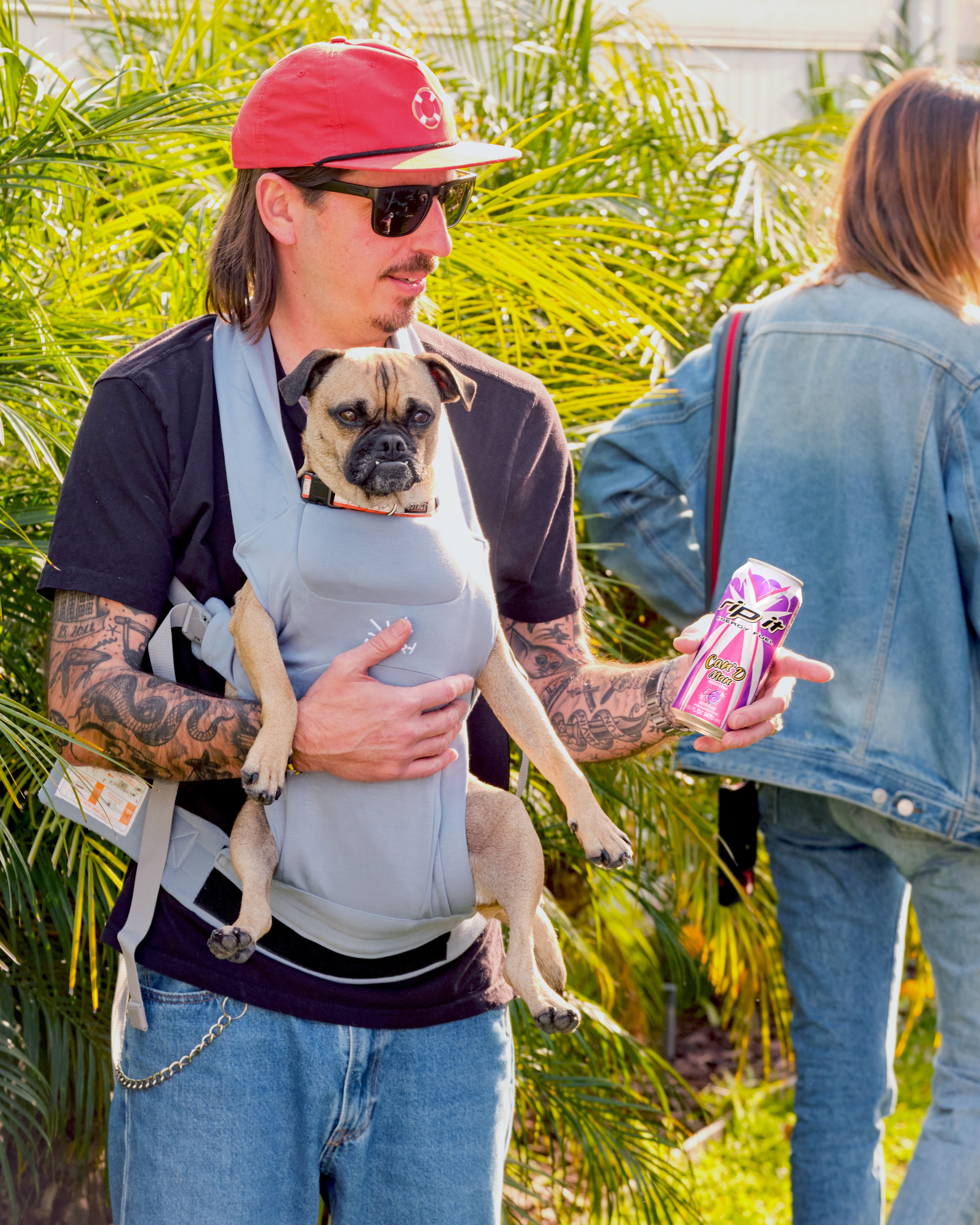 A man holding a dog in a carrier and a colorful energy drink can.​​​​‌﻿‍﻿​‍​‍‌‍﻿﻿‌﻿​‍‌‍‍‌‌‍‌﻿‌‍‍‌‌‍﻿‍​‍​‍​﻿‍‍​‍​‍‌﻿​﻿‌‍​‌‌‍﻿‍‌‍‍‌‌﻿‌​‌﻿‍‌​‍﻿‍‌‍‍‌‌‍﻿﻿​‍​‍​‍﻿​​‍​‍‌‍‍​‌﻿​‍‌‍‌‌‌‍‌‍​‍​‍​﻿‍‍​‍​‍‌‍‍​‌﻿‌​‌﻿‌​‌﻿​​‌﻿​﻿​﻿‍‍​‍﻿﻿​‍﻿﻿‌﻿‌﻿‌﻿‌﻿‌﻿‌﻿​‍﻿‍‌﻿​‍‌‍‍‌‌﻿​​‌‍‍‌‌﻿‌​‌‍‌‌‌‍﻿‍‌‍‌‌‌﻿​‍‌‍‌﻿‌﻿‍‌​‍﻿‍‌‍​﻿‌‍﻿﻿‌‍﻿‌​‍﻿﻿‌‍‍‌‌‍﻿‍‌﻿‌​‌‍‌‌‌‍﻿‍‌﻿‌​​‍﻿﻿‌‍‌‌‌‍‌​‌‍‍‌‌﻿‌​​‍﻿﻿‌‍﻿‌‌‍﻿﻿‌‍‌​‌‍‌‌​﻿﻿‌‌﻿​​‌﻿​‍‌‍‌‌‌﻿​﻿‌‍‌‌‌‍﻿‍‌﻿‌​‌‍​‌‌﻿‌​‌‍‍‌‌‍﻿﻿‌‍﻿‍​﻿‍﻿‌‍‍‌‌‍‌​​﻿﻿‌‌‍​‌​﻿‌​​﻿​‍‌‍​‌​﻿‌﻿​﻿​​​﻿‍​​﻿‌‌​‍﻿‌​﻿​﻿​﻿‌‌​﻿​​​﻿​‍​‍﻿‌​﻿‌​​﻿​​​﻿‌​​﻿​‍​‍﻿‌‌‍​‌‌‍​‌‌‍‌‌‌‍‌‍​‍﻿‌​﻿​​​﻿​‌‌‍​‍‌‍‌‌​﻿​﻿​﻿‌​​﻿‍‌​﻿‌​‌‍​﻿​﻿‍​‌‍‌‍‌‍‌​​﻿‍﻿‌﻿‌​‌﻿‍‌‌﻿​​‌‍‌‌​﻿﻿‌‌‍﻿‌‌‍﻿﻿‌‍‌​‌﻿‌‌‌‍﻿​‌‍‌‌​﻿‍﻿‌﻿​​‌‍​‌‌﻿‌​‌‍‍​​﻿﻿‌‌‍​﻿‌‍​‌‌﻿​‍‌‍‌​‌‌​﻿‌‍​﻿‌﻿​‍‌‍﻿﻿‌‍﻿​‌‍﻿​​‍﻿‍‌﻿‌​‌‍﻿﻿‌﻿​​‌‌﻿﻿‌﻿​﻿‌‍​﻿‌﻿​‍‌‍﻿﻿‌‍﻿​‌‍﻿​​‍‌‌​﻿‌‌‌​​‍‌‌﻿﻿‌‍‍﻿‌‍‌‌‌﻿‍‌​‍‌‌​﻿​﻿‌​‌​​‍‌‌​﻿​﻿‌​‌​​‍‌‌​﻿​‍​﻿​‍‌‍‌‍​﻿‌‌‌‍​﻿‌‍‌‌​﻿​﻿‌‍‌‌‌‍‌‍​﻿‌‍‌‍​﻿​﻿‍‌​﻿‍‌‌‍‌‍​‍‌‌​﻿​‍​﻿​‍​‍‌‌​﻿‌‌‌​‌​​‍﻿‍‌‍‍‌‌‍﻿‌‌‍​‌‌‍‌﻿‌‍‌‌​‍﻿‍‌‍​‌‌‍﻿​‌﻿‌​​﻿﻿﻿‌‍​‍‌‍​‌‌﻿​﻿‌‍‌‌‌‌‌‌‌﻿​‍‌‍﻿​​﻿﻿‌‌‍‍​‌﻿‌​‌﻿‌​‌﻿​​‌﻿​﻿​‍‌‌​﻿​﻿‌​​‌​‍‌‌​﻿​‍‌​‌‍​‍‌‌​﻿​‍‌​‌‍‌﻿‌﻿‌﻿‌﻿‌﻿‌﻿​‍﻿‍‌﻿​‍‌‍‍‌‌﻿​​‌‍‍‌‌﻿‌​‌‍‌‌‌‍﻿‍‌‍‌‌‌﻿​‍‌‍‌﻿‌﻿‍‌​‍﻿‍‌‍​﻿‌‍﻿﻿‌‍﻿‌​‍‌‍‌‍‍‌‌‍‌​​﻿﻿‌‌‍​‌​﻿‌​​﻿​‍‌‍​‌​﻿‌﻿​﻿​​​﻿‍​​﻿‌‌​‍﻿‌​﻿​﻿​﻿‌‌​﻿​​​﻿​‍​‍﻿‌​﻿‌​​﻿​​​﻿‌​​﻿​‍​‍﻿‌‌‍​‌‌‍​‌‌‍‌‌‌‍‌‍​‍﻿‌​﻿​​​﻿​‌‌‍​‍‌‍‌‌​﻿​﻿​﻿‌​​﻿‍‌​﻿‌​‌‍​﻿​﻿‍​‌‍‌‍‌‍‌​​‍‌‍‌﻿‌​‌﻿‍‌‌﻿​​‌‍‌‌​﻿﻿‌‌‍﻿‌‌‍﻿﻿‌‍‌​‌﻿‌‌‌‍﻿​‌‍‌‌​‍‌‍‌﻿​​‌‍​‌‌﻿‌​‌‍‍​​﻿﻿‌‌‍​﻿‌‍​‌‌﻿​‍‌‍‌​‌‌​﻿‌‍​﻿‌﻿​‍‌‍﻿﻿‌‍﻿​‌‍﻿​​‍﻿‍‌﻿‌​‌‍﻿﻿‌﻿​​‌‌﻿﻿‌﻿​﻿‌‍​﻿‌﻿​‍‌‍﻿﻿‌‍﻿​‌‍﻿​​‍‌‌​﻿‌‌‌​​‍‌‌﻿﻿‌‍‍﻿‌‍‌‌‌﻿‍‌​‍‌‌​﻿​﻿‌​‌​​‍‌‌​﻿​﻿‌​‌​​‍‌‌​﻿​‍​﻿​‍‌‍‌‍​﻿‌‌‌‍​﻿‌‍‌‌​﻿​﻿‌‍‌‌‌‍‌‍​﻿‌‍‌‍​﻿​﻿‍‌​﻿‍‌‌‍‌‍​‍‌‌​﻿​‍​﻿​‍​‍‌‌​﻿‌‌‌​‌​​‍﻿‍‌‍‍‌‌‍﻿‌‌‍​‌‌‍‌﻿‌‍‌‌​‍﻿‍‌‍​‌‌‍﻿​‌﻿‌​​‍​‍‌﻿﻿‌