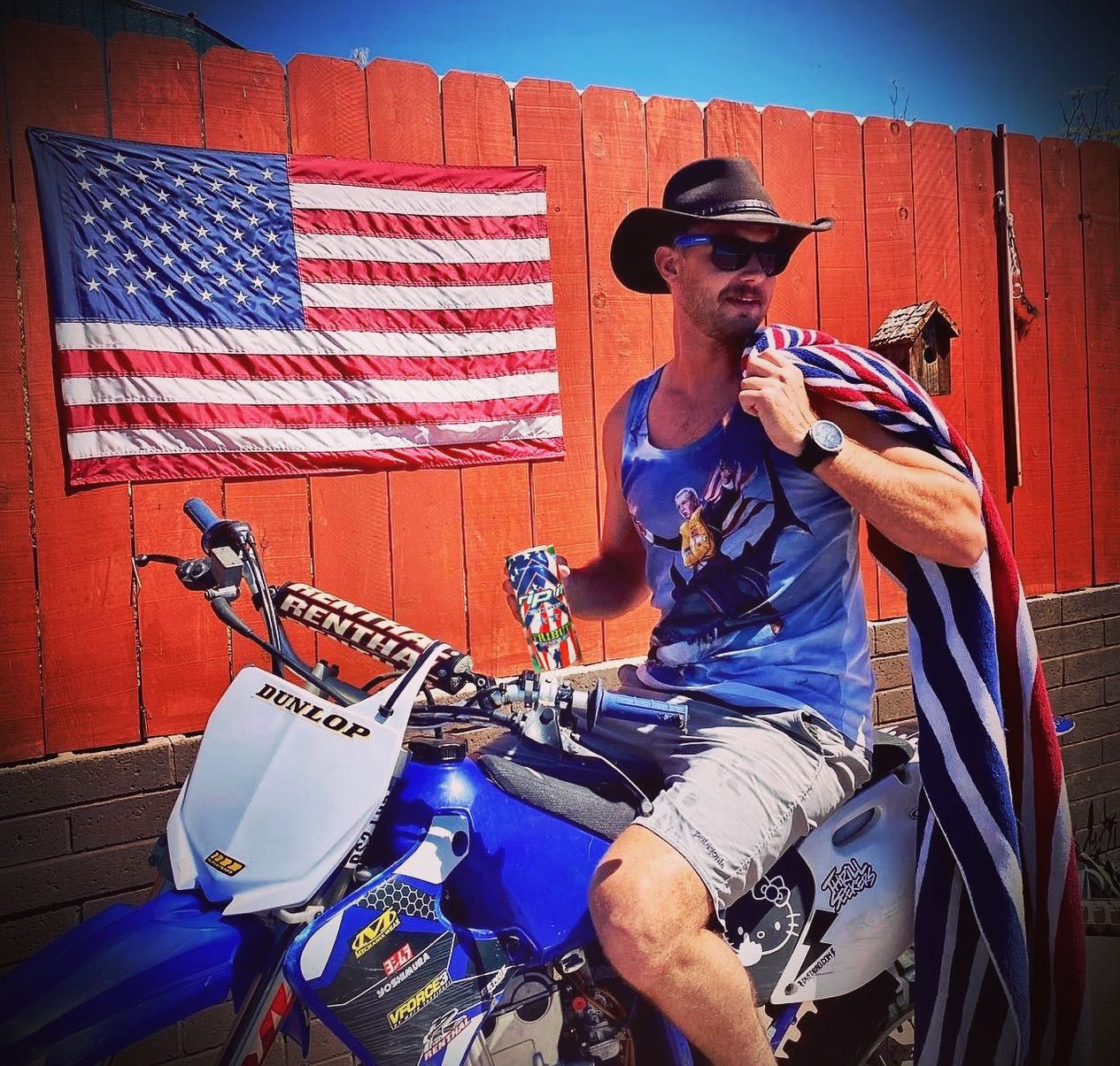 Person holding a Rip It can while sitting on a dirt bike, with an American flag in the background.​​​​‌﻿‍﻿​‍​‍‌‍﻿﻿‌﻿​‍‌‍‍‌‌‍‌﻿‌‍‍‌‌‍﻿‍​‍​‍​﻿‍‍​‍​‍‌﻿​﻿‌‍​‌‌‍﻿‍‌‍‍‌‌﻿‌​‌﻿‍‌​‍﻿‍‌‍‍‌‌‍﻿﻿​‍​‍​‍﻿​​‍​‍‌‍‍​‌﻿​‍‌‍‌‌‌‍‌‍​‍​‍​﻿‍‍​‍​‍‌‍‍​‌﻿‌​‌﻿‌​‌﻿​​‌﻿​﻿​﻿‍‍​‍﻿﻿​‍﻿﻿‌﻿‌﻿‌﻿‌﻿‌﻿‌﻿​‍﻿‍‌﻿​‍‌‍‍‌‌﻿​​‌‍‍‌‌﻿‌​‌‍‌‌‌‍﻿‍‌‍‌‌‌﻿​‍‌‍‌﻿‌﻿‍‌​‍﻿‍‌‍​﻿‌‍﻿﻿‌‍﻿‌​‍﻿﻿‌‍‍‌‌‍﻿‍‌﻿‌​‌‍‌‌‌‍﻿‍‌﻿‌​​‍﻿﻿‌‍‌‌‌‍‌​‌‍‍‌‌﻿‌​​‍﻿﻿‌‍﻿‌‌‍﻿﻿‌‍‌​‌‍‌‌​﻿﻿‌‌﻿​​‌﻿​‍‌‍‌‌‌﻿​﻿‌‍‌‌‌‍﻿‍‌﻿‌​‌‍​‌‌﻿‌​‌‍‍‌‌‍﻿﻿‌‍﻿‍​﻿‍﻿‌‍‍‌‌‍‌​​﻿﻿‌‌‍​‌​﻿‌​​﻿​‍‌‍​‌​﻿‌﻿​﻿​​​﻿‍​​﻿‌‌​‍﻿‌​﻿​﻿​﻿‌‌​﻿​​​﻿​‍​‍﻿‌​﻿‌​​﻿​​​﻿‌​​﻿​‍​‍﻿‌‌‍​‌‌‍​‌‌‍‌‌‌‍‌‍​‍﻿‌​﻿​​​﻿​‌‌‍​‍‌‍‌‌​﻿​﻿​﻿‌​​﻿‍‌​﻿‌​‌‍​﻿​﻿‍​‌‍‌‍‌‍‌​​﻿‍﻿‌﻿‌​‌﻿‍‌‌﻿​​‌‍‌‌​﻿﻿‌‌‍﻿‌‌‍﻿﻿‌‍‌​‌﻿‌‌‌‍﻿​‌‍‌‌​﻿‍﻿‌﻿​​‌‍​‌‌﻿‌​‌‍‍​​﻿﻿‌‌‍​﻿‌‍​‌‌﻿​‍‌‍‌​‌‌​﻿‌‍​﻿‌﻿​‍‌‍﻿﻿‌‍﻿​‌‍﻿​​‍﻿‍‌﻿‌​‌‍﻿﻿‌﻿​​‌‌﻿﻿‌﻿​﻿‌‍​﻿‌﻿​‍‌‍﻿﻿‌‍﻿​‌‍﻿​​‍‌‌​﻿‌‌‌​​‍‌‌﻿﻿‌‍‍﻿‌‍‌‌‌﻿‍‌​‍‌‌​﻿​﻿‌​‌​​‍‌‌​﻿​﻿‌​‌​​‍‌‌​﻿​‍​﻿​‍‌‍‌‌​﻿‌‌​﻿‌‍‌‍‌​‌‍‌‍​﻿‌​‌‍​﻿​﻿‍​‌‍​﻿‌‍​﻿​﻿‌​​﻿​‍​‍‌‌​﻿​‍​﻿​‍​‍‌‌​﻿‌‌‌​‌​​‍﻿‍‌‍‍‌‌‍﻿‌‌‍​‌‌‍‌﻿‌‍‌‌​‍﻿‍‌‍​‌‌‍﻿​‌﻿‌​​﻿﻿﻿‌‍​‍‌‍​‌‌﻿​﻿‌‍‌‌‌‌‌‌‌﻿​‍‌‍﻿​​﻿﻿‌‌‍‍​‌﻿‌​‌﻿‌​‌﻿​​‌﻿​﻿​‍‌‌​﻿​﻿‌​​‌​‍‌‌​﻿​‍‌​‌‍​‍‌‌​﻿​‍‌​‌‍‌﻿‌﻿‌﻿‌﻿‌﻿‌﻿​‍﻿‍‌﻿​‍‌‍‍‌‌﻿​​‌‍‍‌‌﻿‌​‌‍‌‌‌‍﻿‍‌‍‌‌‌﻿​‍‌‍‌﻿‌﻿‍‌​‍﻿‍‌‍​﻿‌‍﻿﻿‌‍﻿‌​‍‌‍‌‍‍‌‌‍‌​​﻿﻿‌‌‍​‌​﻿‌​​﻿​‍‌‍​‌​﻿‌﻿​﻿​​​﻿‍​​﻿‌‌​‍﻿‌​﻿​﻿​﻿‌‌​﻿​​​﻿​‍​‍﻿‌​﻿‌​​﻿​​​﻿‌​​﻿​‍​‍﻿‌‌‍​‌‌‍​‌‌‍‌‌‌‍‌‍​‍﻿‌​﻿​​​﻿​‌‌‍​‍‌‍‌‌​﻿​﻿​﻿‌​​﻿‍‌​﻿‌​‌‍​﻿​﻿‍​‌‍‌‍‌‍‌​​‍‌‍‌﻿‌​‌﻿‍‌‌﻿​​‌‍‌‌​﻿﻿‌‌‍﻿‌‌‍﻿﻿‌‍‌​‌﻿‌‌‌‍﻿​‌‍‌‌​‍‌‍‌﻿​​‌‍​‌‌﻿‌​‌‍‍​​﻿﻿‌‌‍​﻿‌‍​‌‌﻿​‍‌‍‌​‌‌​﻿‌‍​﻿‌﻿​‍‌‍﻿﻿‌‍﻿​‌‍﻿​​‍﻿‍‌﻿‌​‌‍﻿﻿‌﻿​​‌‌﻿﻿‌﻿​﻿‌‍​﻿‌﻿​‍‌‍﻿﻿‌‍﻿​‌‍﻿​​‍‌‌​﻿‌‌‌​​‍‌‌﻿﻿‌‍‍﻿‌‍‌‌‌﻿‍‌​‍‌‌​﻿​﻿‌​‌​​‍‌‌​﻿​﻿‌​‌​​‍‌‌​﻿​‍​﻿​‍‌‍‌‌​﻿‌‌​﻿‌‍‌‍‌​‌‍‌‍​﻿‌​‌‍​﻿​﻿‍​‌‍​﻿‌‍​﻿​﻿‌​​﻿​‍​‍‌‌​﻿​‍​﻿​‍​‍‌‌​﻿‌‌‌​‌​​‍﻿‍‌‍‍‌‌‍﻿‌‌‍​‌‌‍‌﻿‌‍‌‌​‍﻿‍‌‍​‌‌‍﻿​‌﻿‌​​‍​‍‌﻿﻿‌