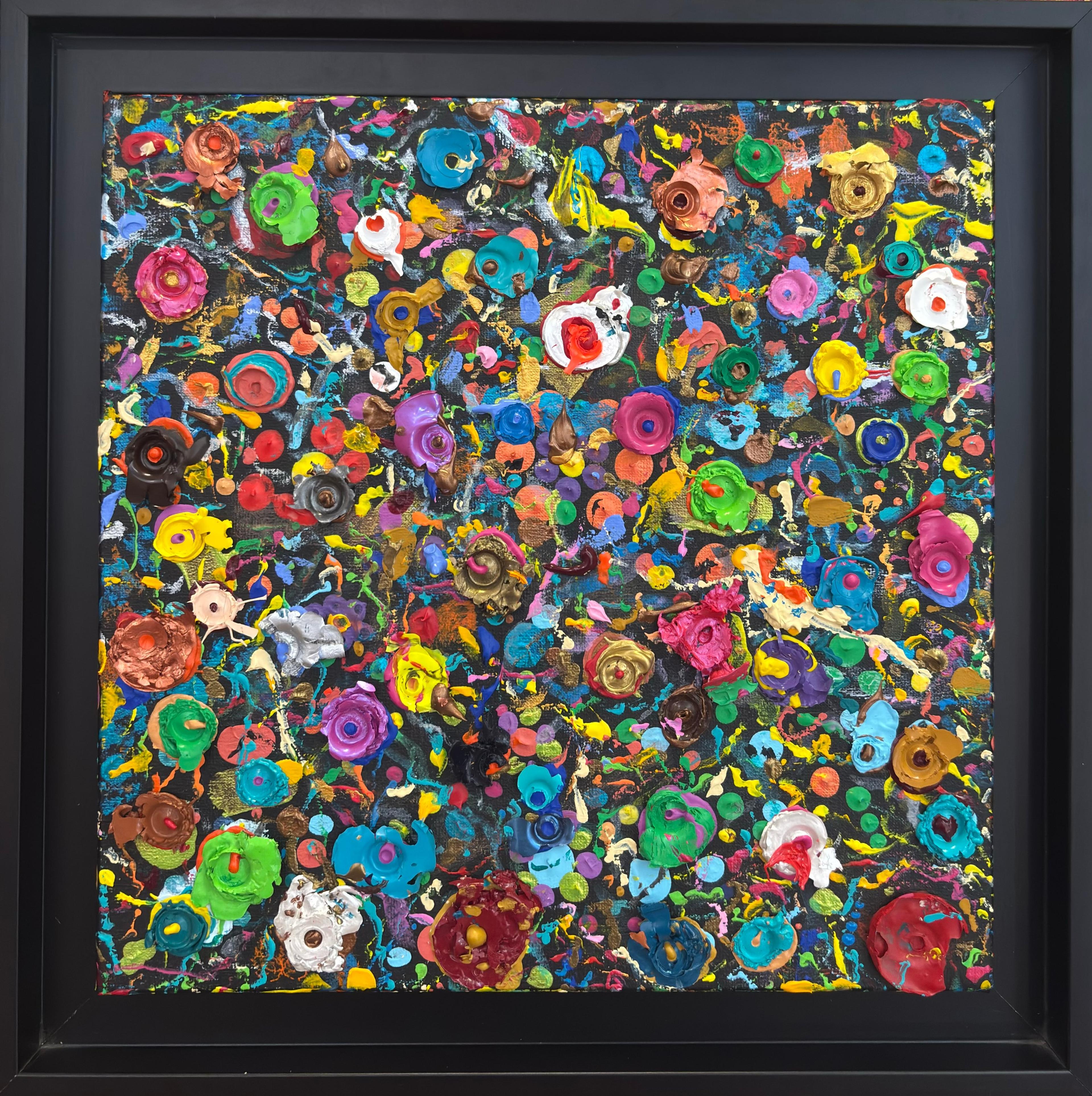 Tableau abstrait contemporain 'Big bang chromatique' de Caroline Pons, vibrant d'éclats colorés en technique pointilliste texturée sur fond noir, encadré.