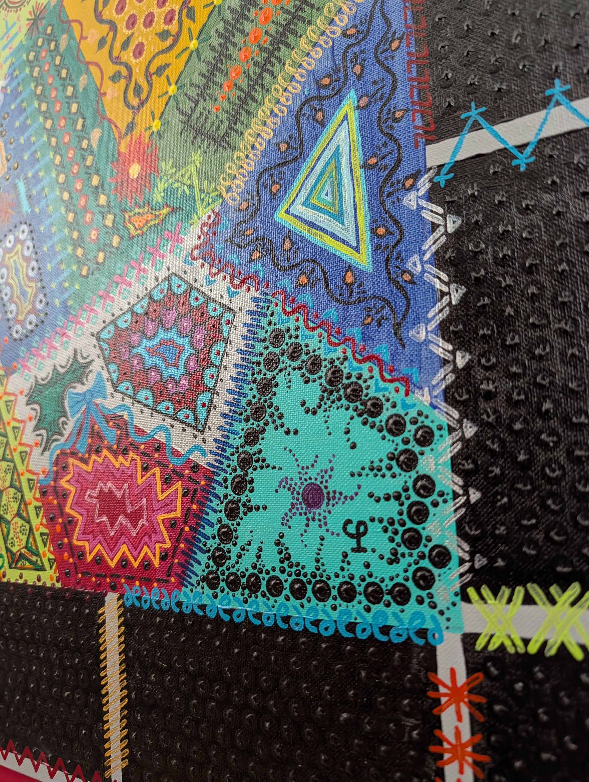 Close-up of Caroline Pons' acrylic canvas: vibrant geometric patterns and detailed dot art in bright blues, teals, greens, and yellows on textured surfaces.