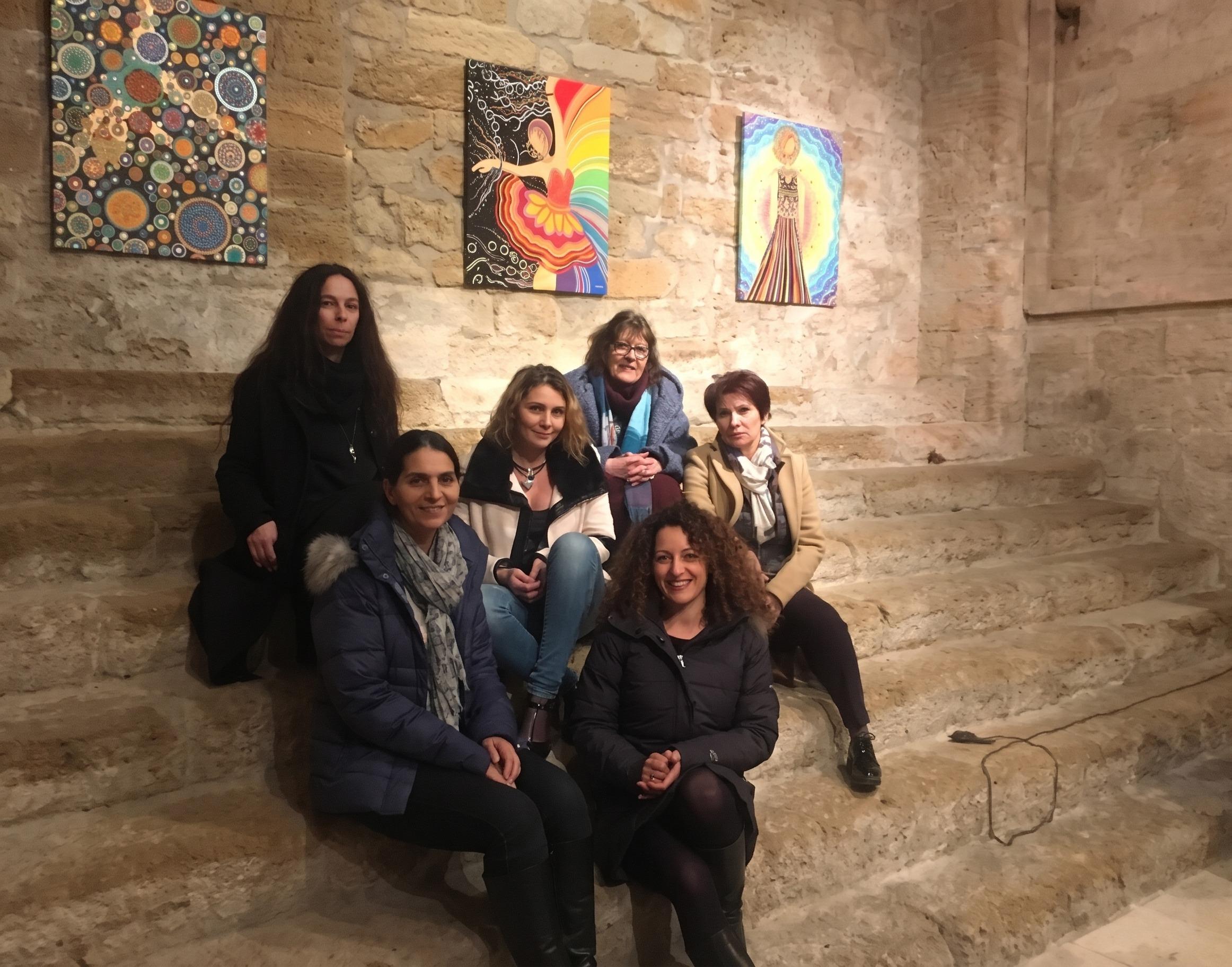 The exhibition’s artists in the Saint-Sulpice chapel, beneath Caroline Pons’ triptych