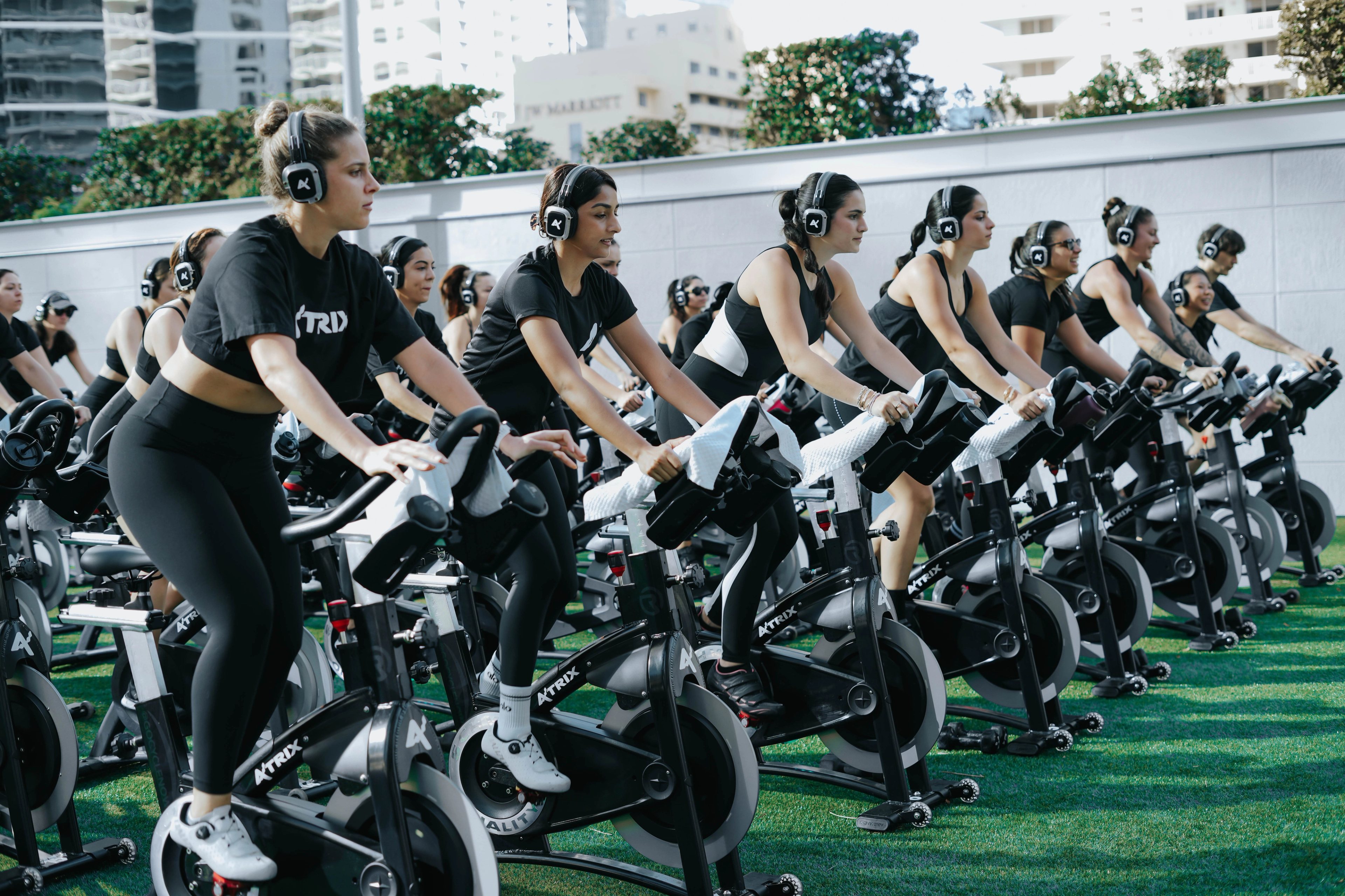 An outdoor cycling class at Atrix Club's Brickell terrace.