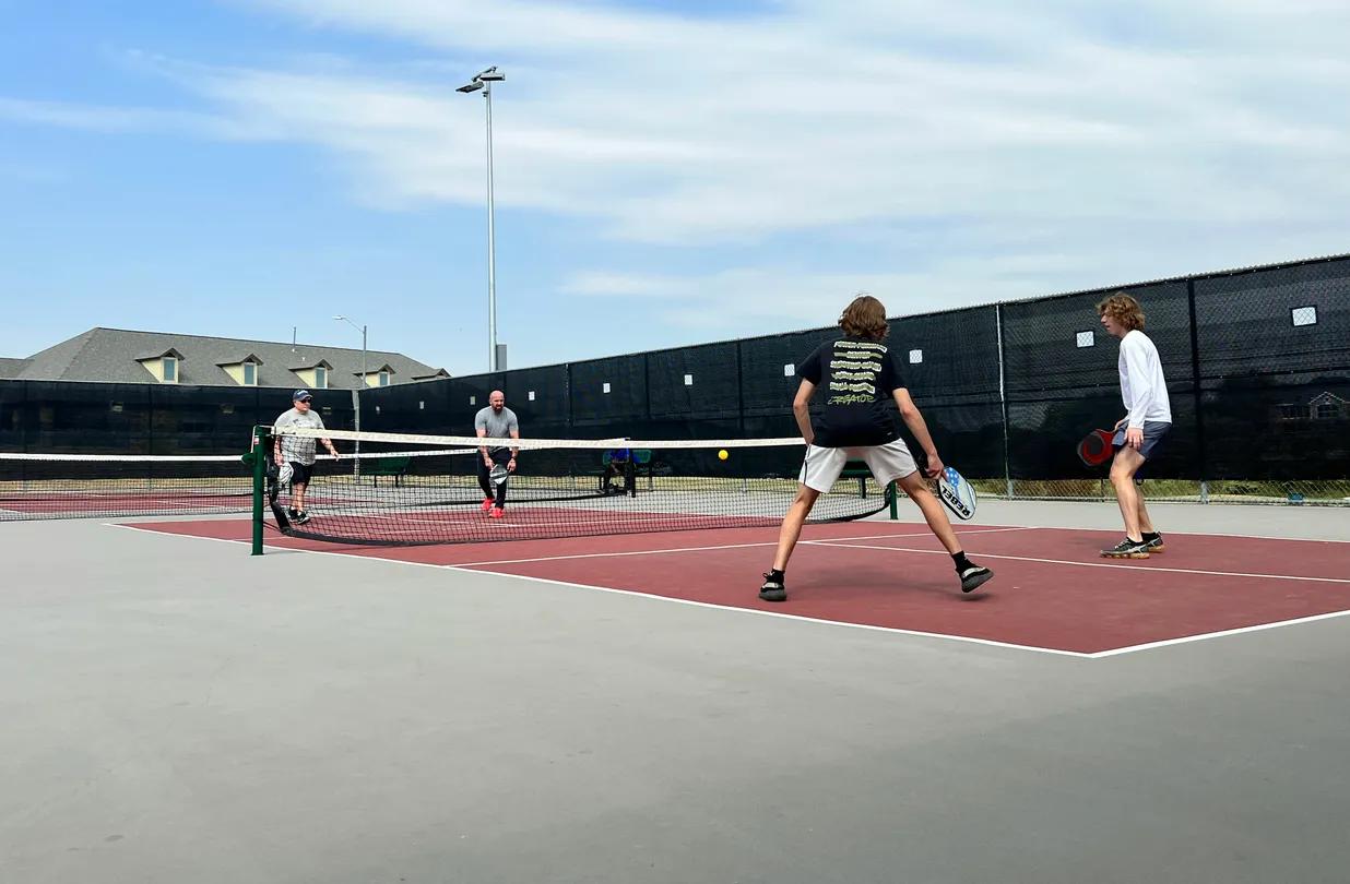 Can You Reach Over the Kitchen Line to Hit a Ball? Pickleball Rules Guide