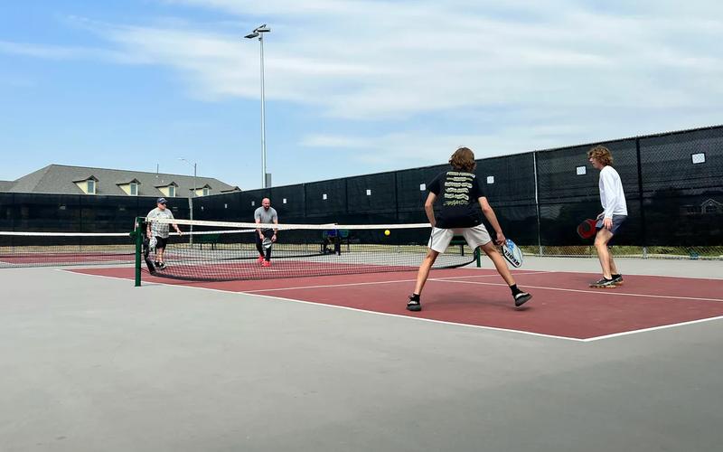 Can You Reach Over the Kitchen Line to Hit a Ball? Pickleball Rules Guide