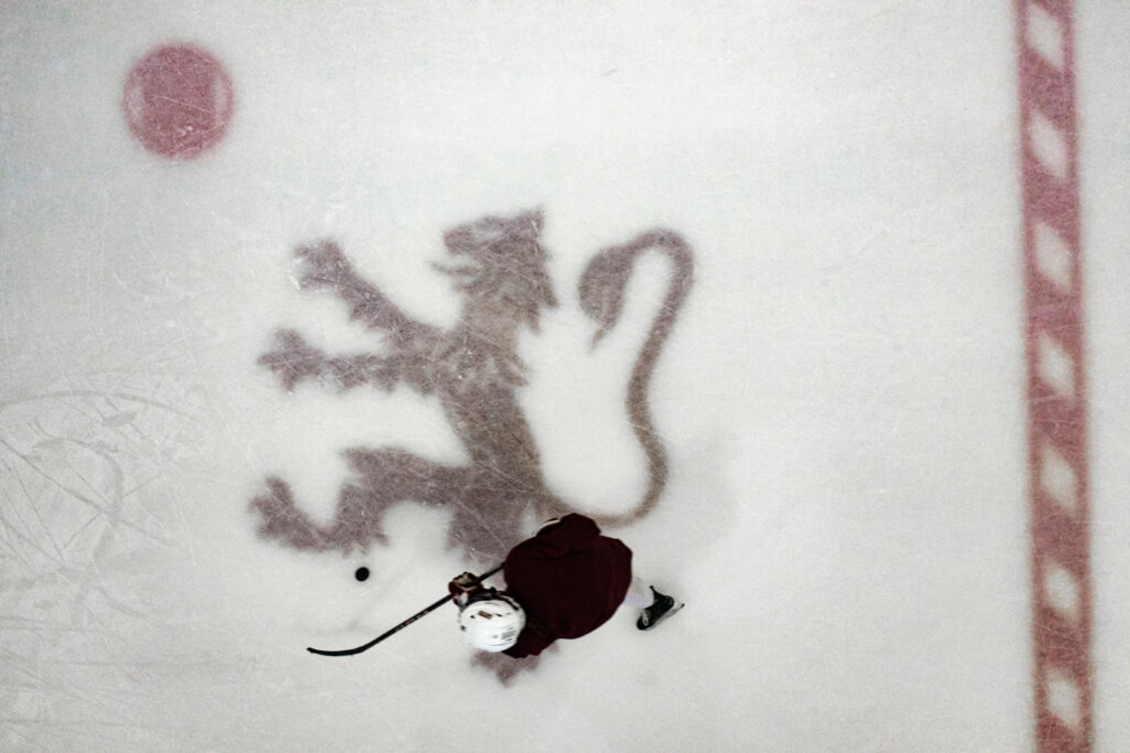 A hockey player skating on the ice