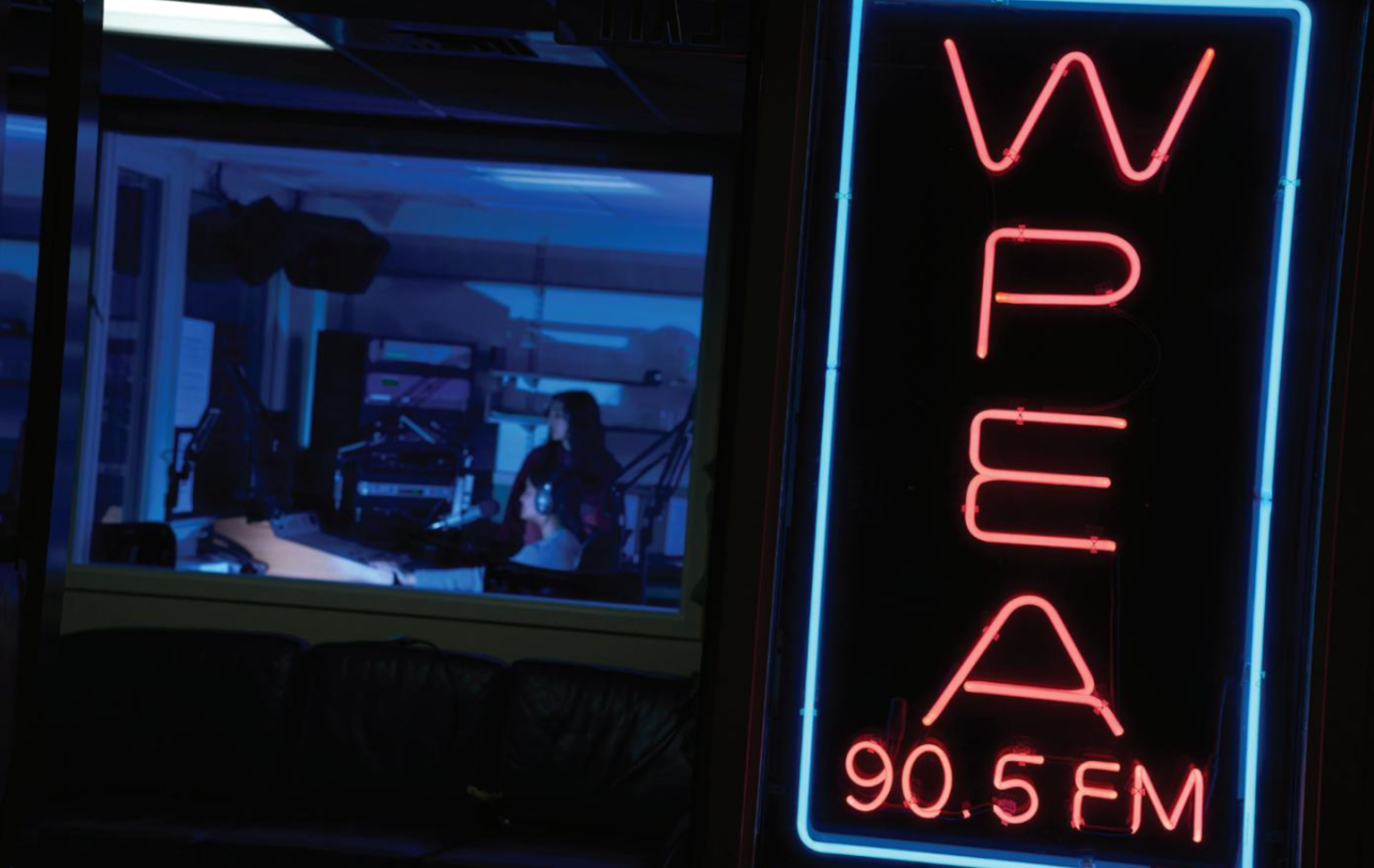 Neon signs and a radio booth.