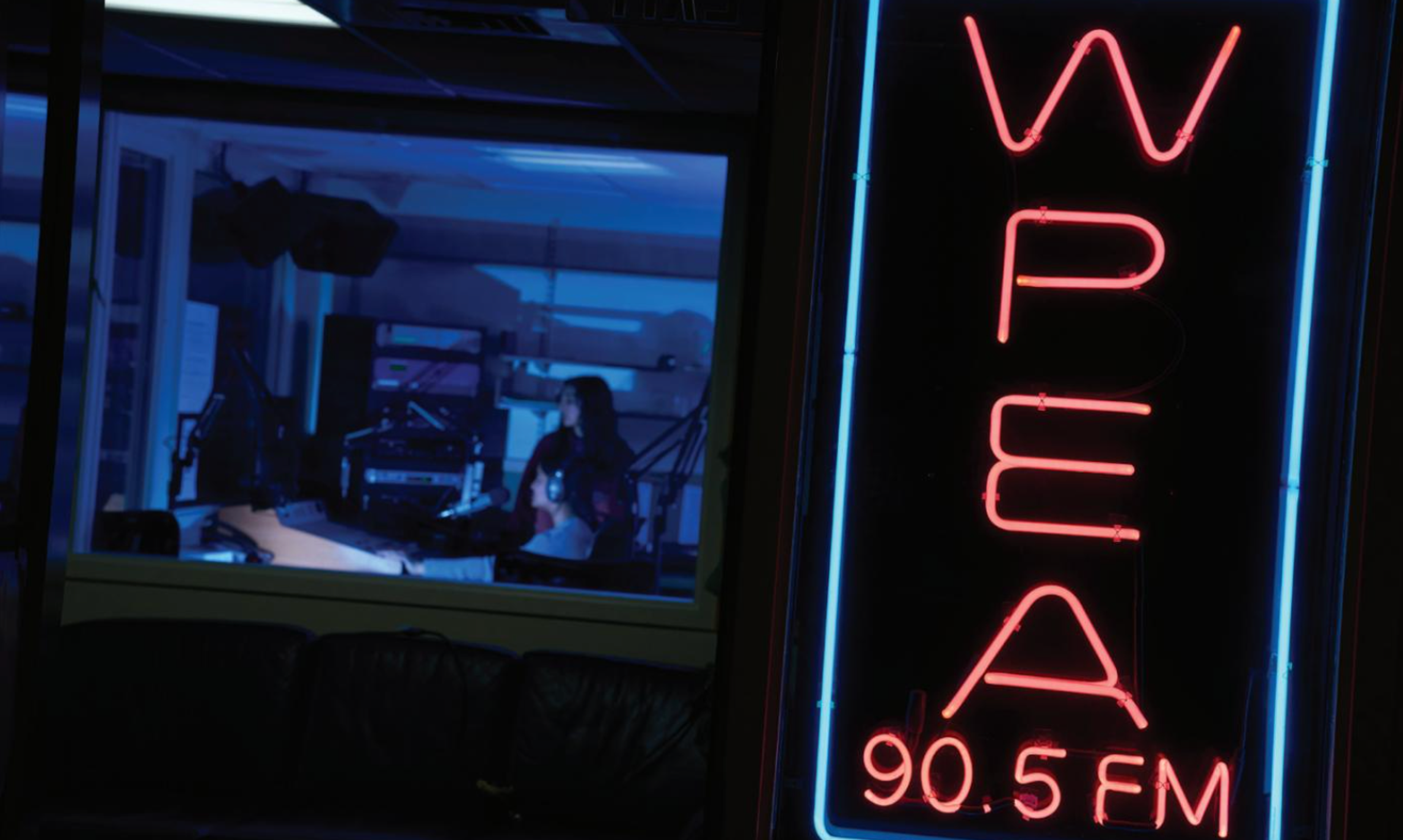 Neon signs and a radio booth.